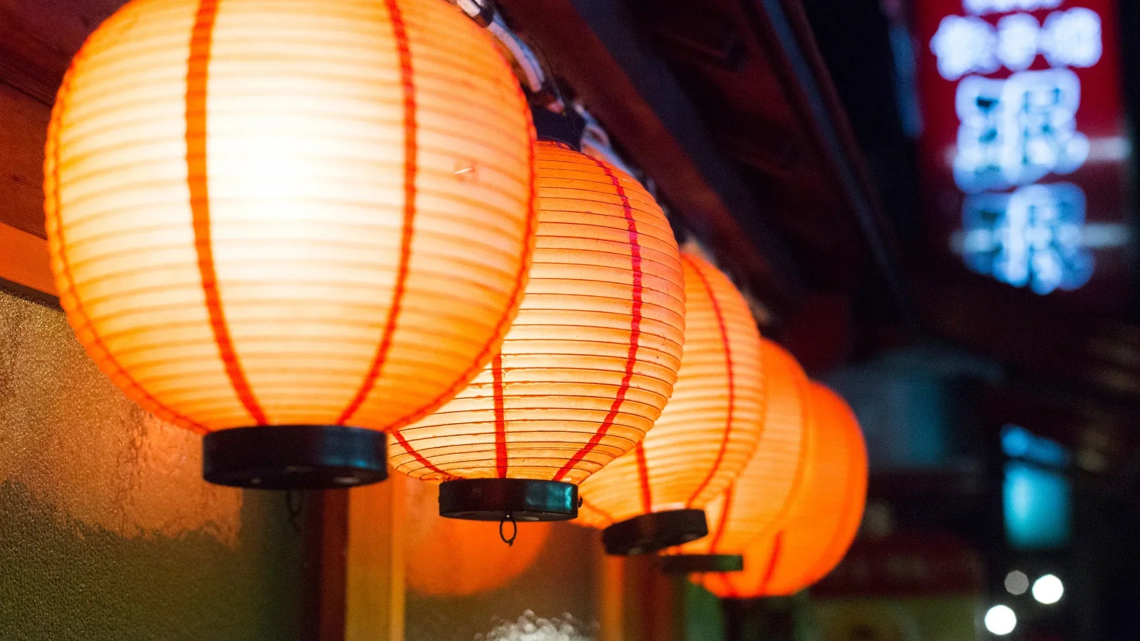 Traditional Japanese rice paper shoji lamps providing soft, warm lighting for a serene and minimalist home ambiance.