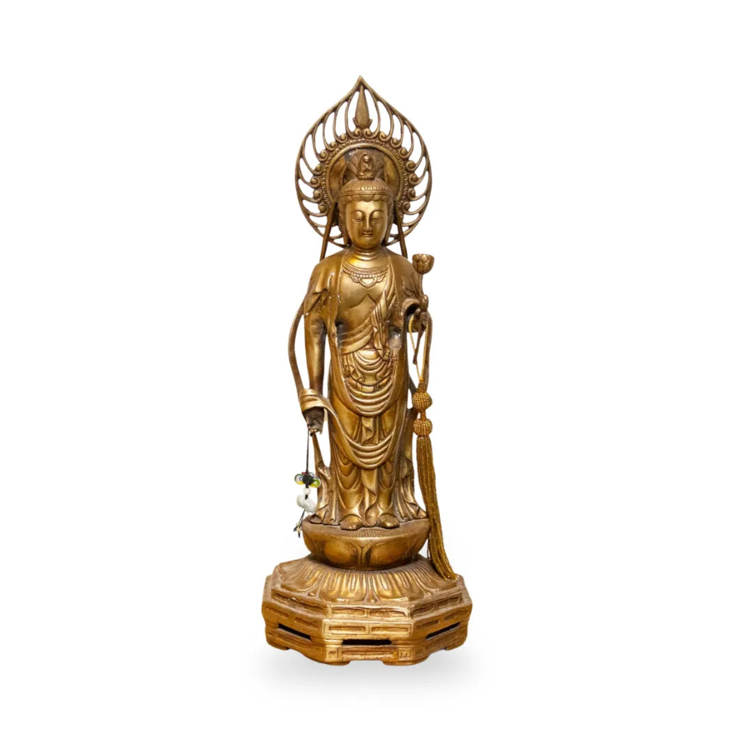 Vintage Japanese brass Buddha statue from the mid-20th century, tall Butsuzō sculpture with intricate details and serene expression.
