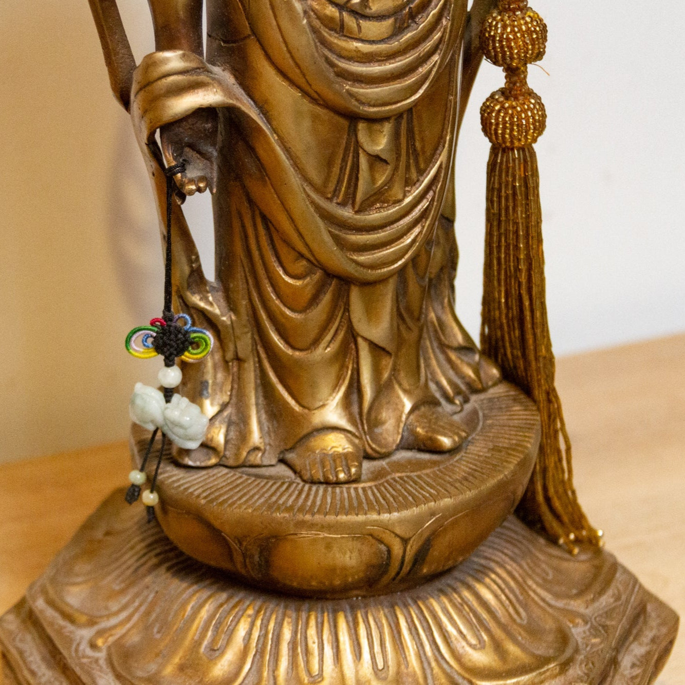 Vintage Japanese brass Buddha statue from the mid-20th century, tall Butsuzō sculpture with intricate details and serene expression.