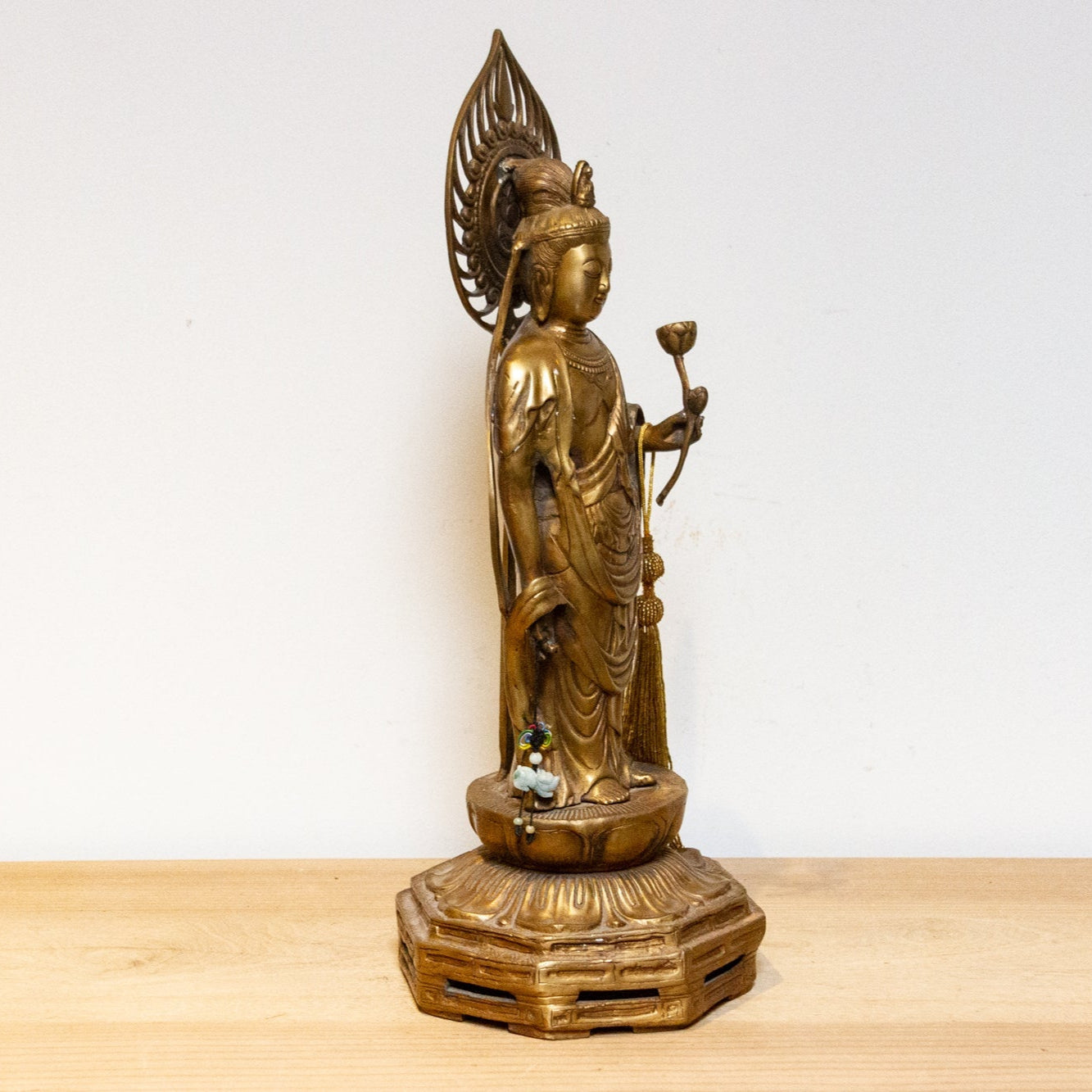 Vintage Japanese brass Buddha statue from the mid-20th century, tall Butsuzō sculpture with intricate details and serene expression.