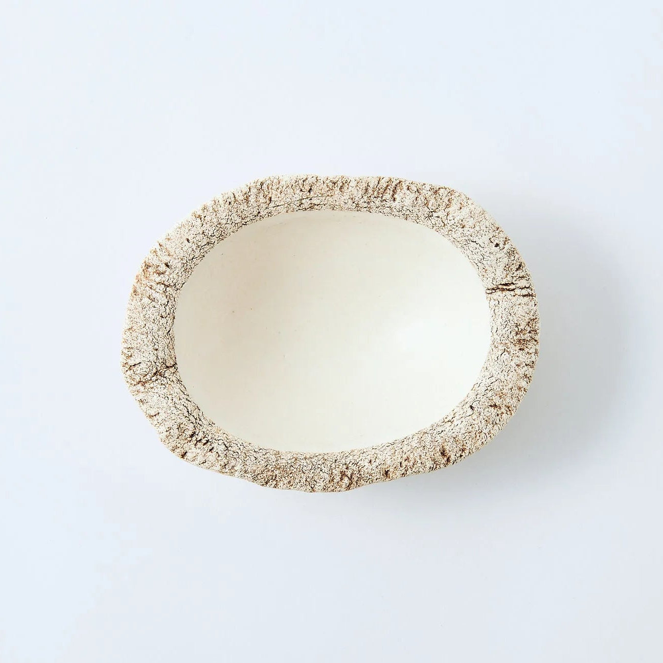 Hakuwa white oval bowl made from Japanese semi-porcelain and clay, handcrafted tableware for modern dining.
