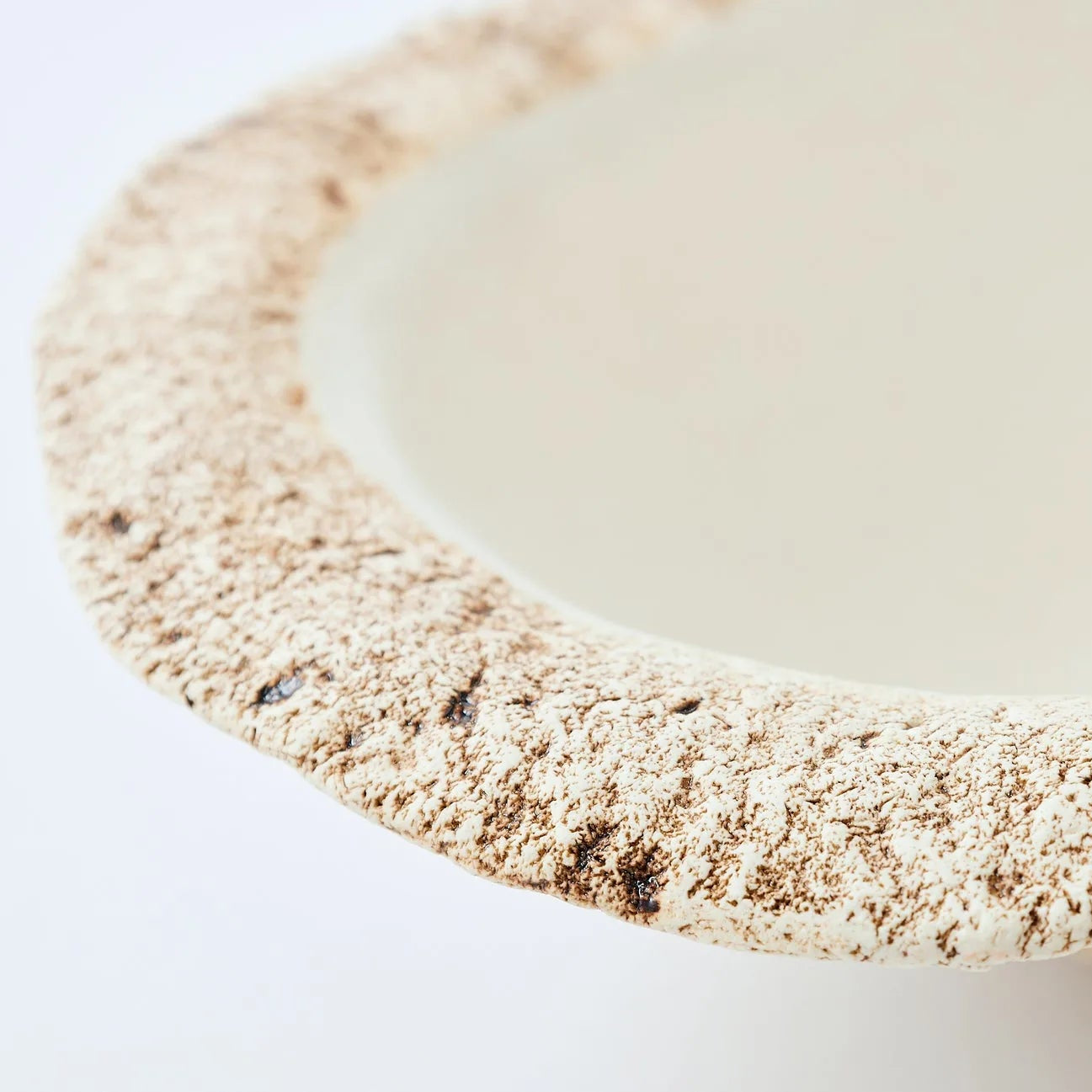 Hakuwa white oval bowl made from Japanese semi-porcelain and clay, handcrafted tableware for modern dining.