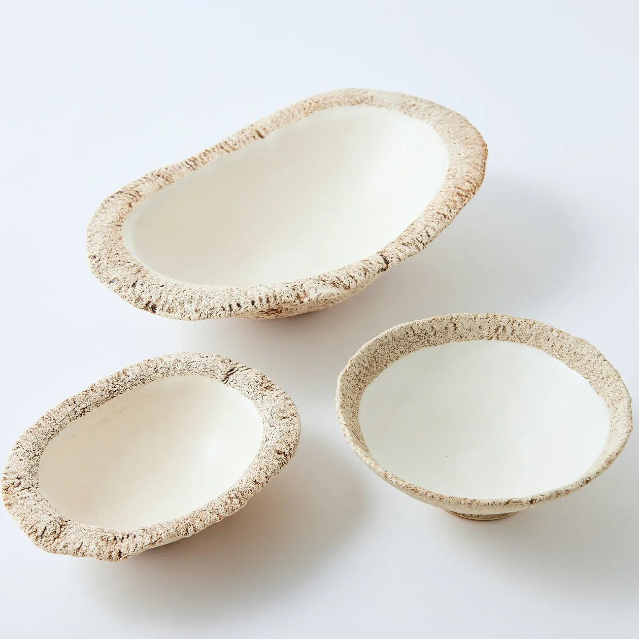 Hakuwa white oval bowl made from Japanese semi-porcelain and clay, handcrafted tableware for modern dining.