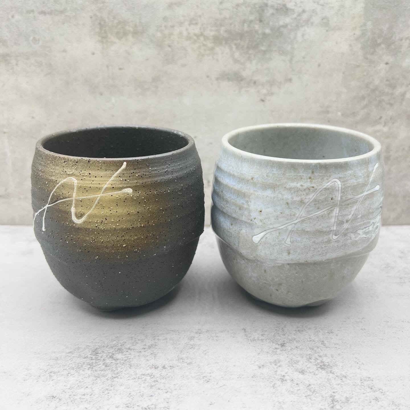 Handcrafted Mino-yaki Yunomi Japanese teacup with traditional glaze, perfect for daily tea rituals.