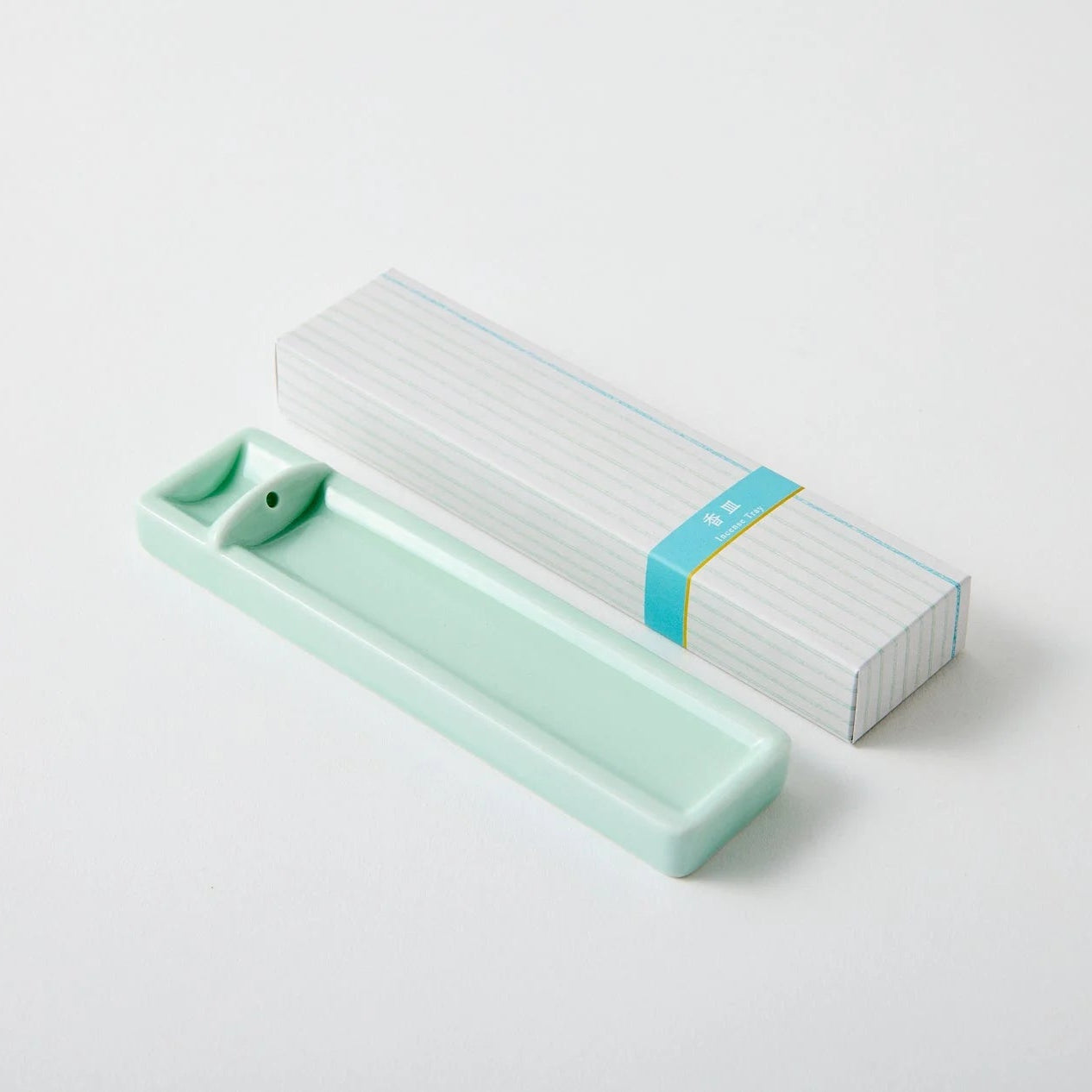 Handmade Japanese long celadon incense holder – ceramic tray for traditional and minimalist incense rituals.