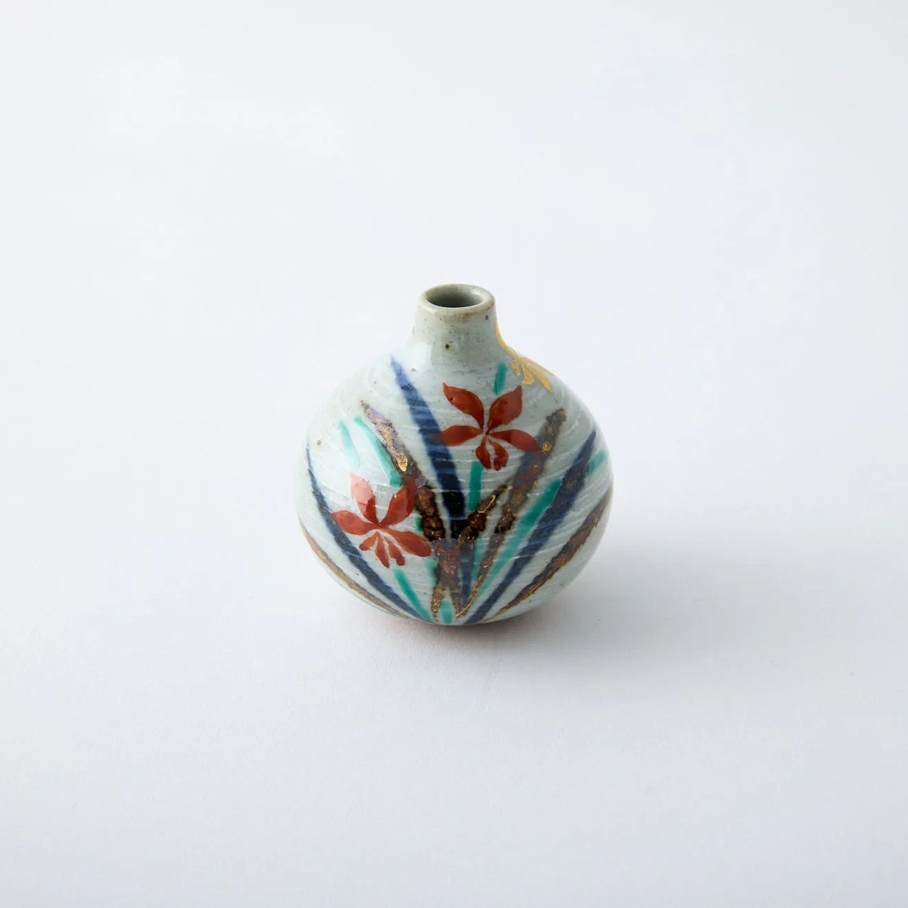Japanese Tesai Kabin ikebana vase with Ran orchid motif, handmade slipware in Karatsu and Amakusa ceramic.