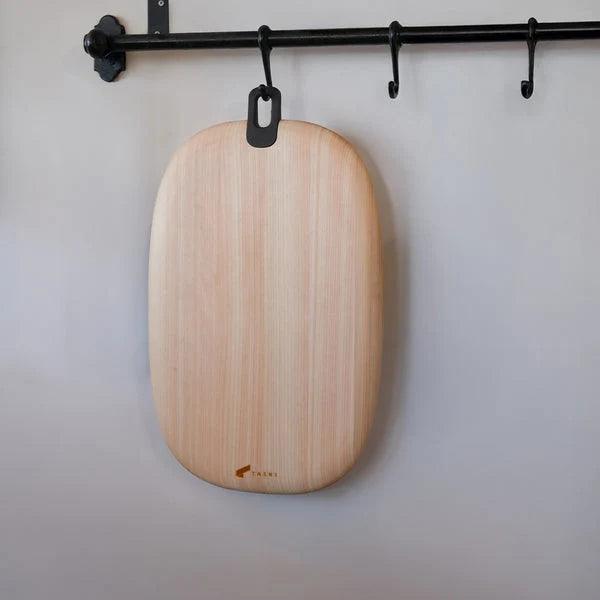 Japanese round wooden cutting board durable kitchen chopping board for food prep and serving.