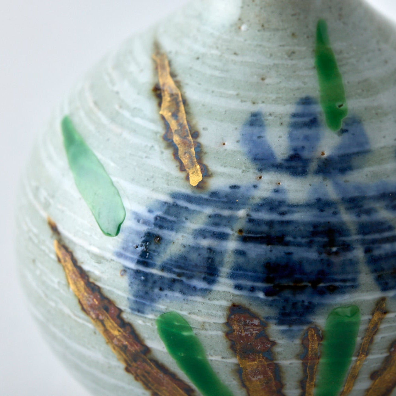 Handmade Japanese ikebana vase, Tesai Kabin with Shoubu iris motif, Karatsu ware and Amakusa porcelain slip.