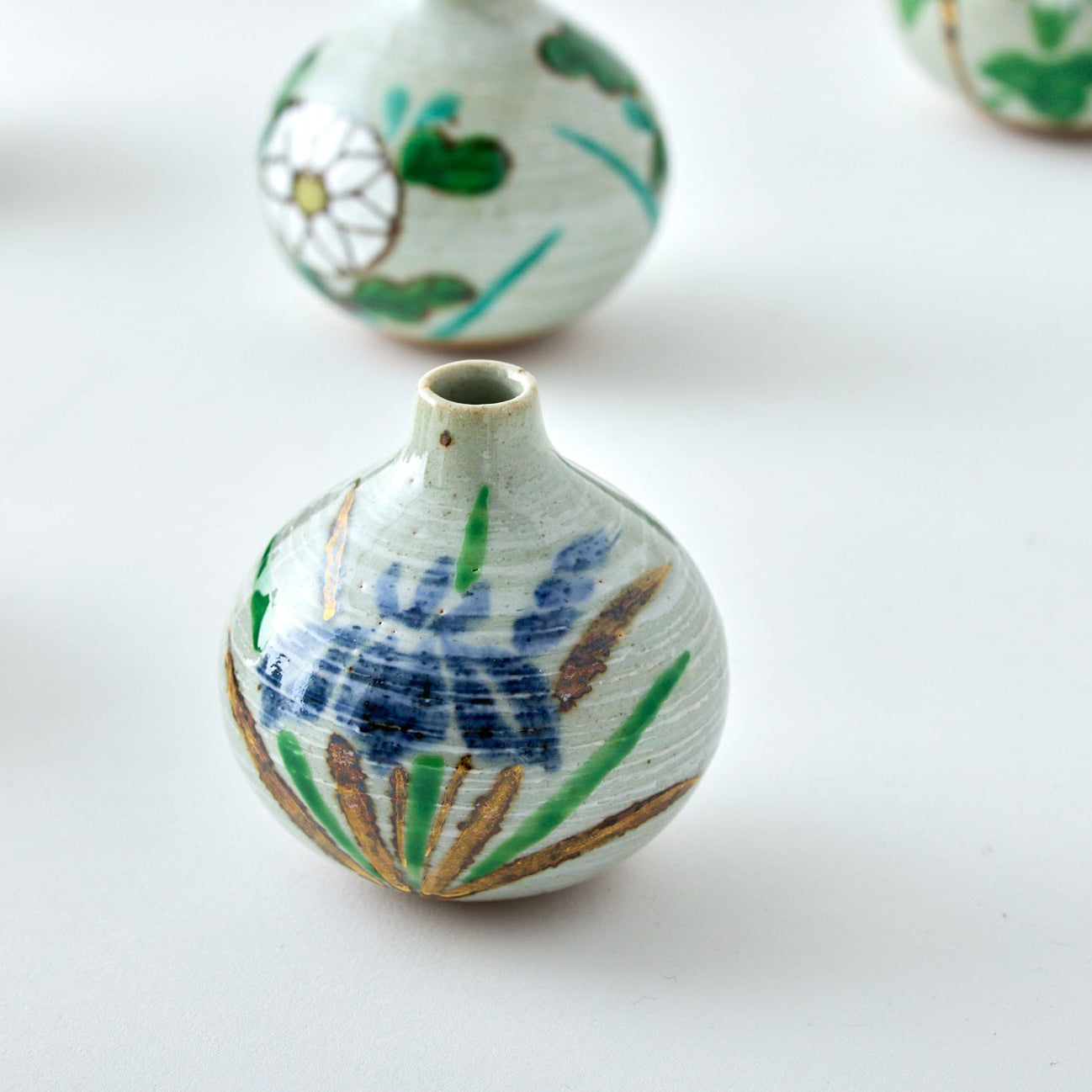 Handmade Japanese ikebana vase, Tesai Kabin with Shoubu iris motif, Karatsu ware and Amakusa porcelain slip.