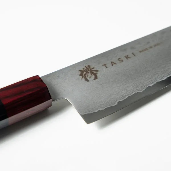 Kaizen 8.5-inch Japanese chef knife with lightweight blade and octagonal handle for precision cutting.