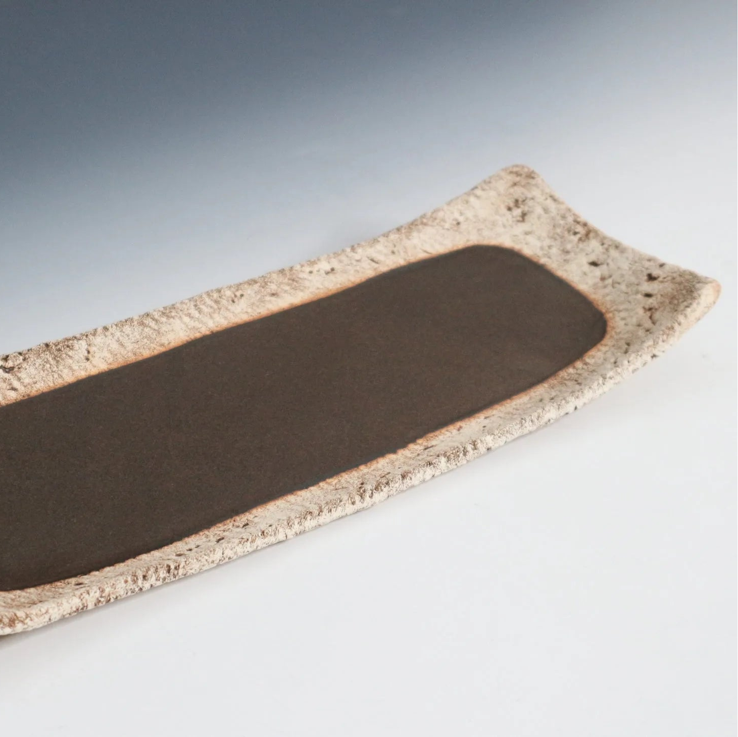 Keshiki Zara Japanese semi-porcelain rectangular plate made from mixed clay for elegant modern dining.