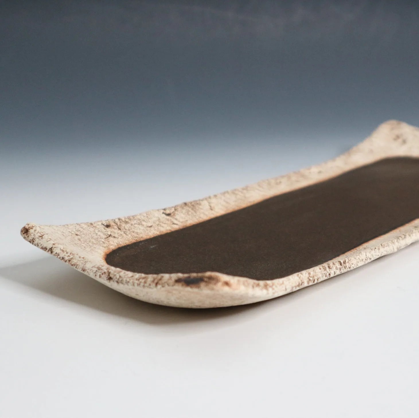 Keshiki Zara Japanese semi-porcelain rectangular plate made from mixed clay for elegant modern dining.