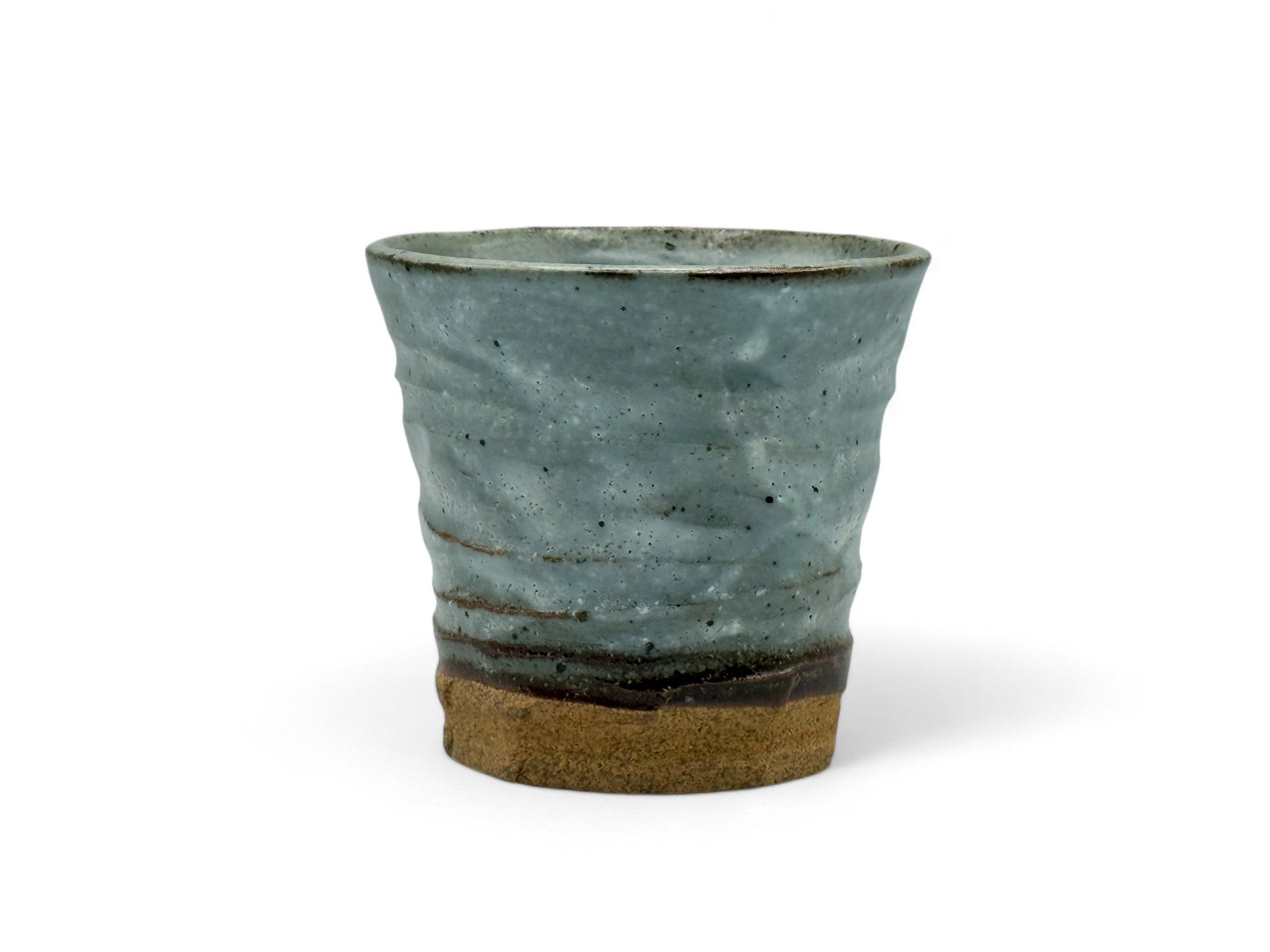 Handcrafted Mino-yaki Yunomi Japanese teacup with traditional glaze, perfect for daily tea rituals.
