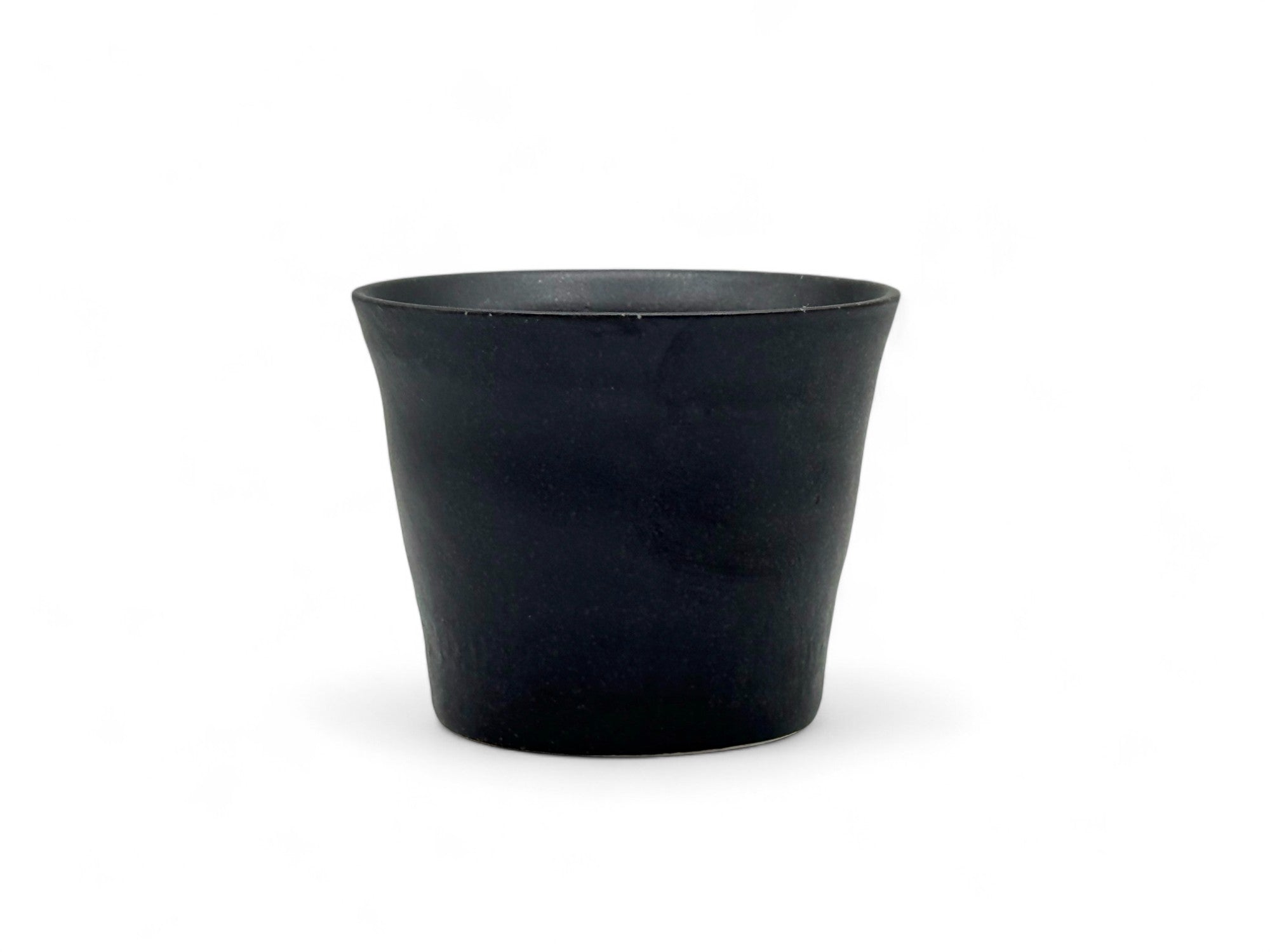 Handcrafted Mino-yaki Yunomi Japanese teacup with traditional glaze, perfect for daily tea rituals.