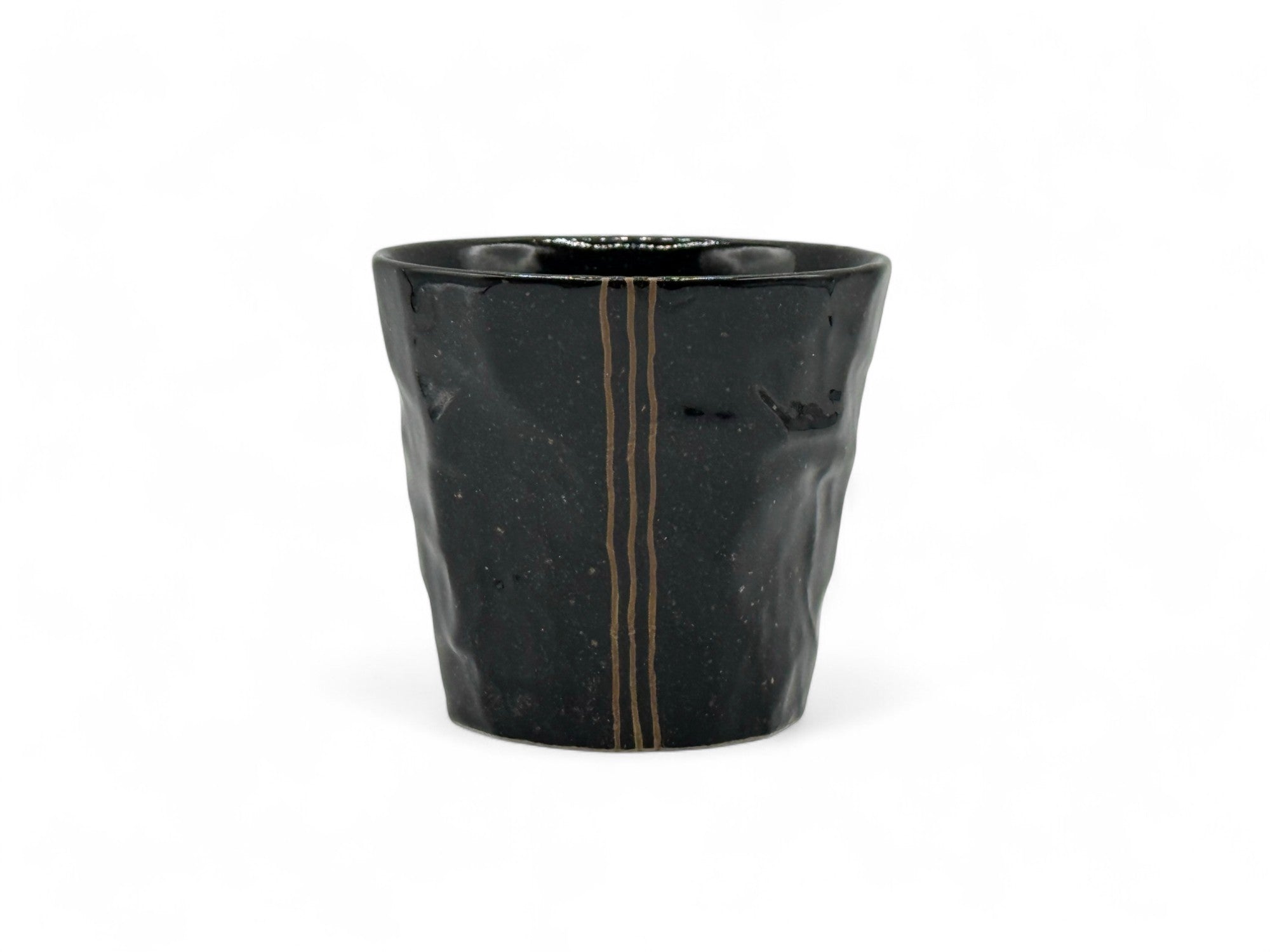 Handcrafted Mino-yaki Yunomi Japanese teacup with traditional glaze, perfect for daily tea rituals.