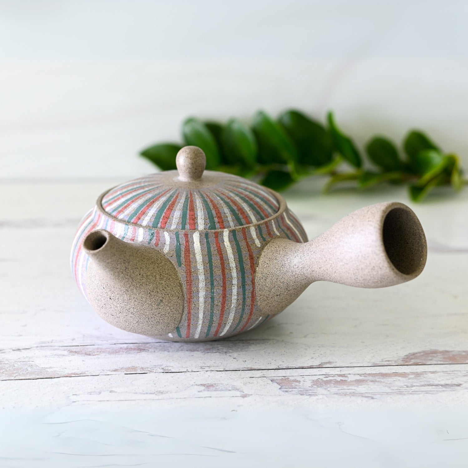 Miyabi Striped Tokoname-Yaki Kyusu Teapot handcrafted in Japanese clay for authentic tea brewing.