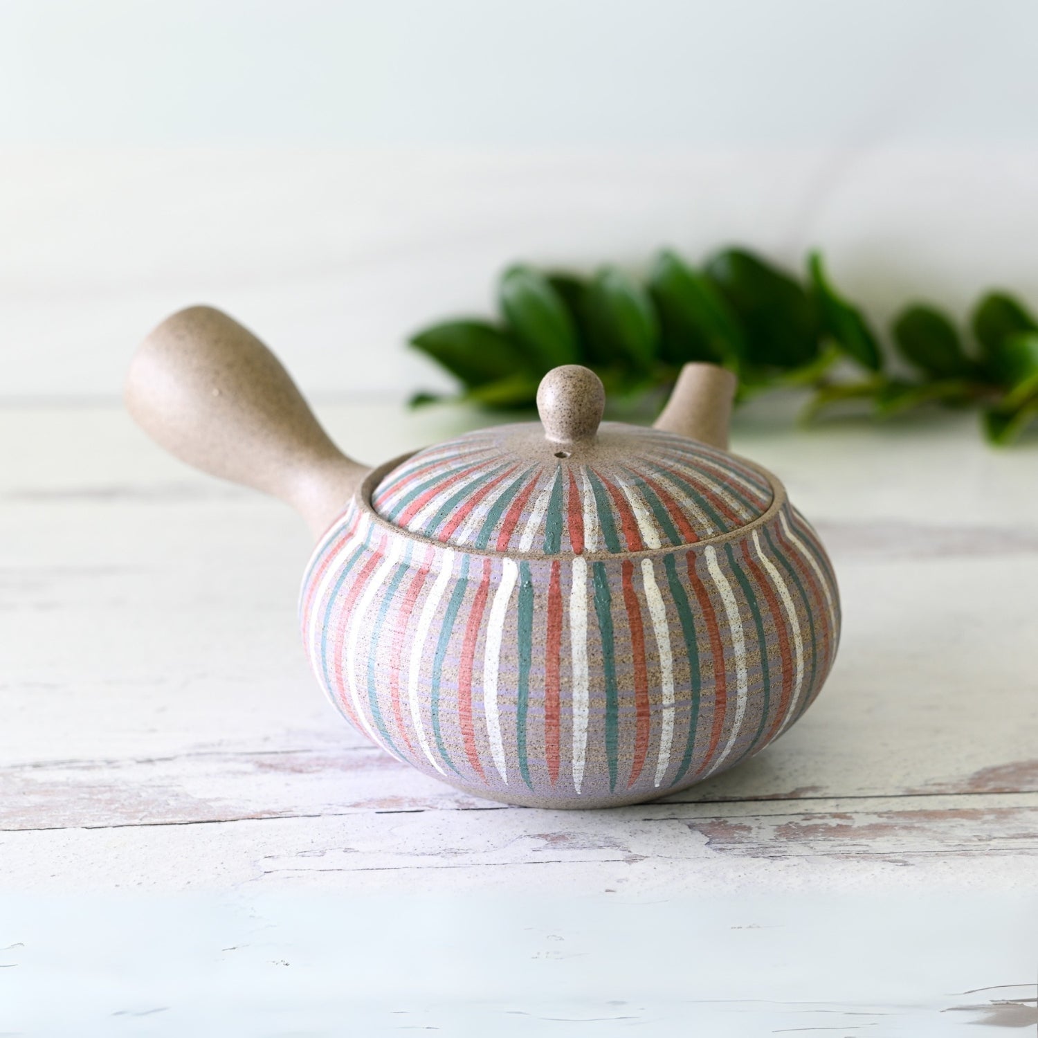 Miyabi Striped Tokoname-Yaki Kyusu Teapot handcrafted in Japanese clay for authentic tea brewing.