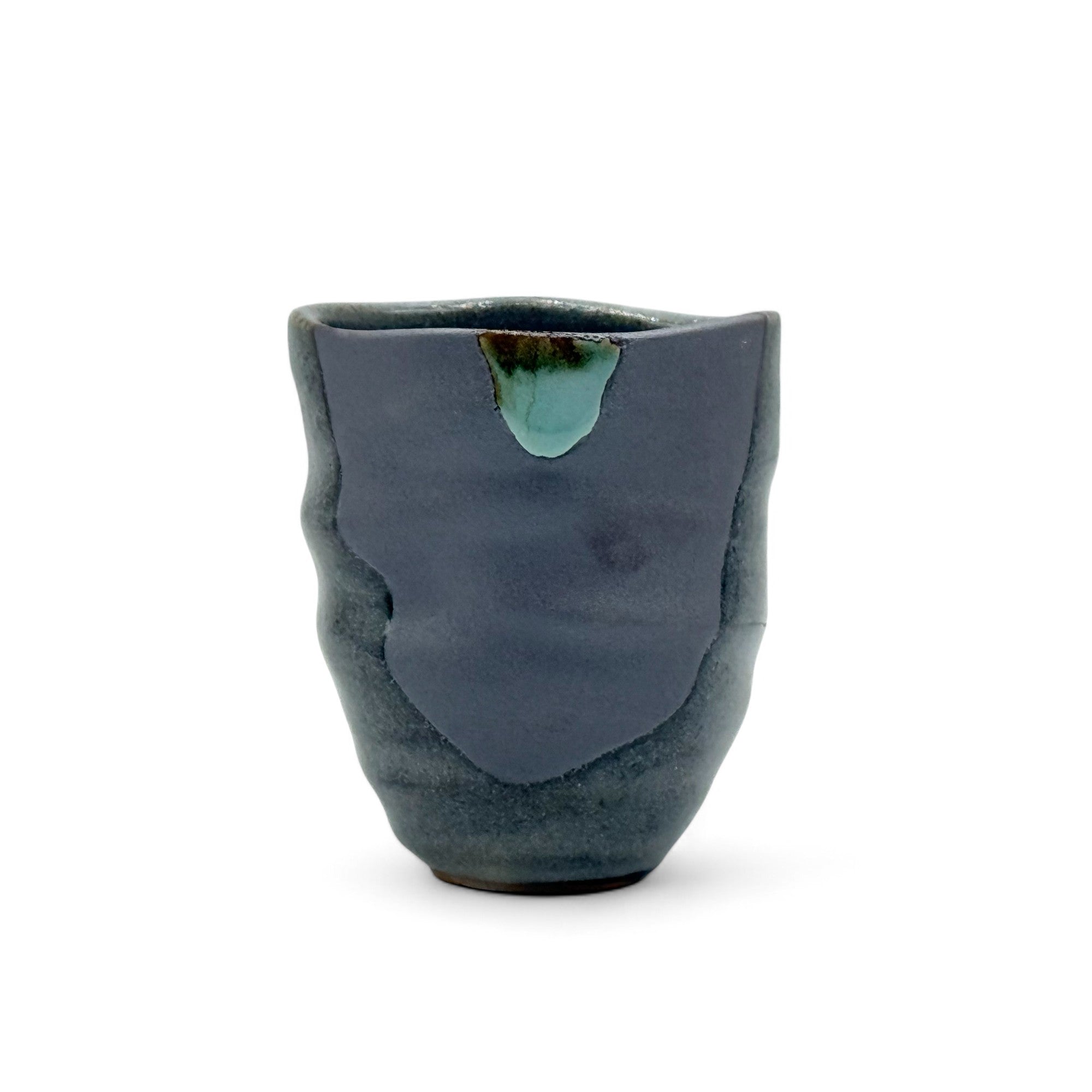 Handcrafted Mino-yaki Yunomi Japanese teacup with traditional glaze, perfect for daily tea rituals.