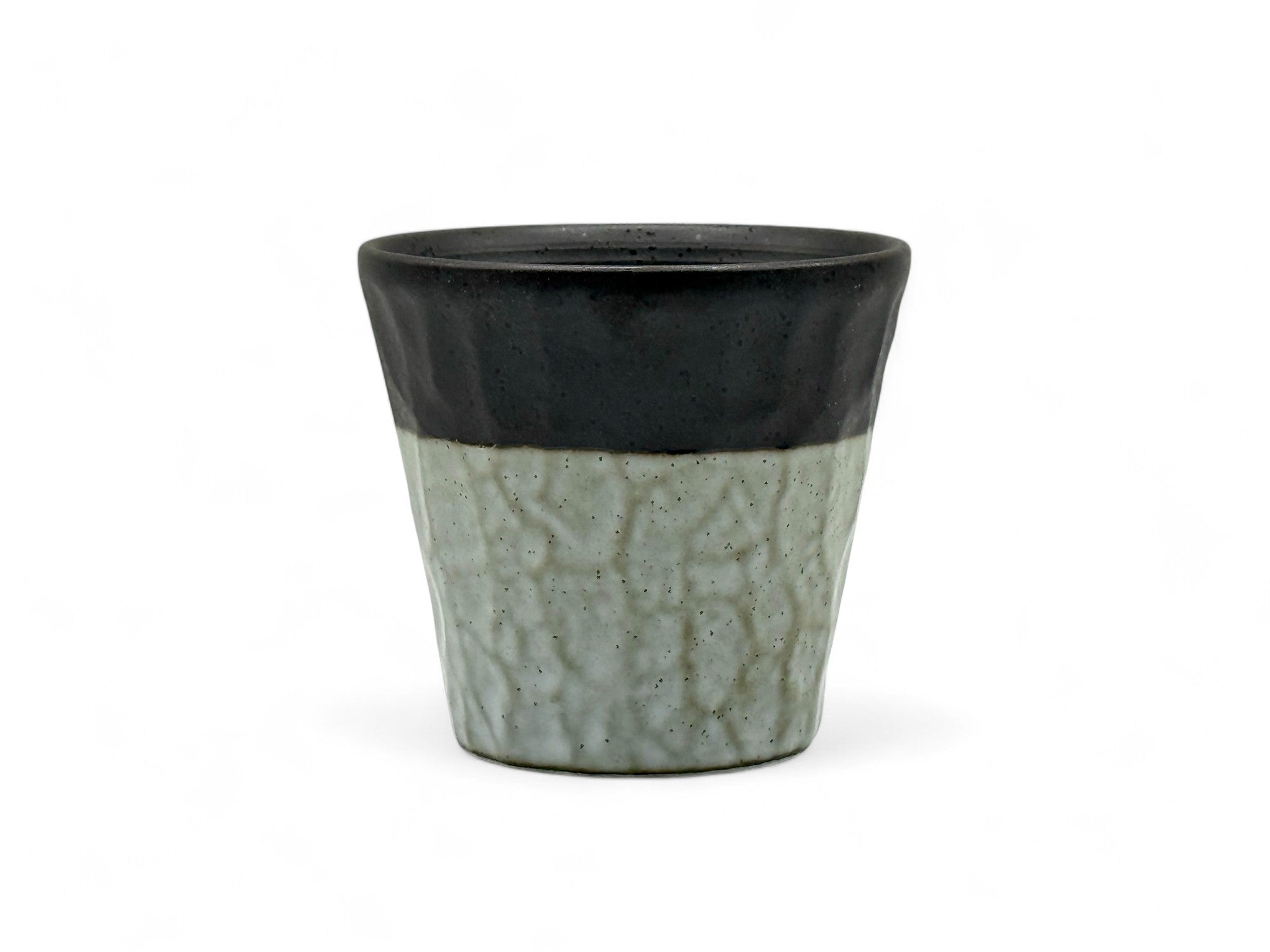 Handcrafted Mino-yaki Yunomi Japanese teacup with traditional glaze, perfect for daily tea rituals.