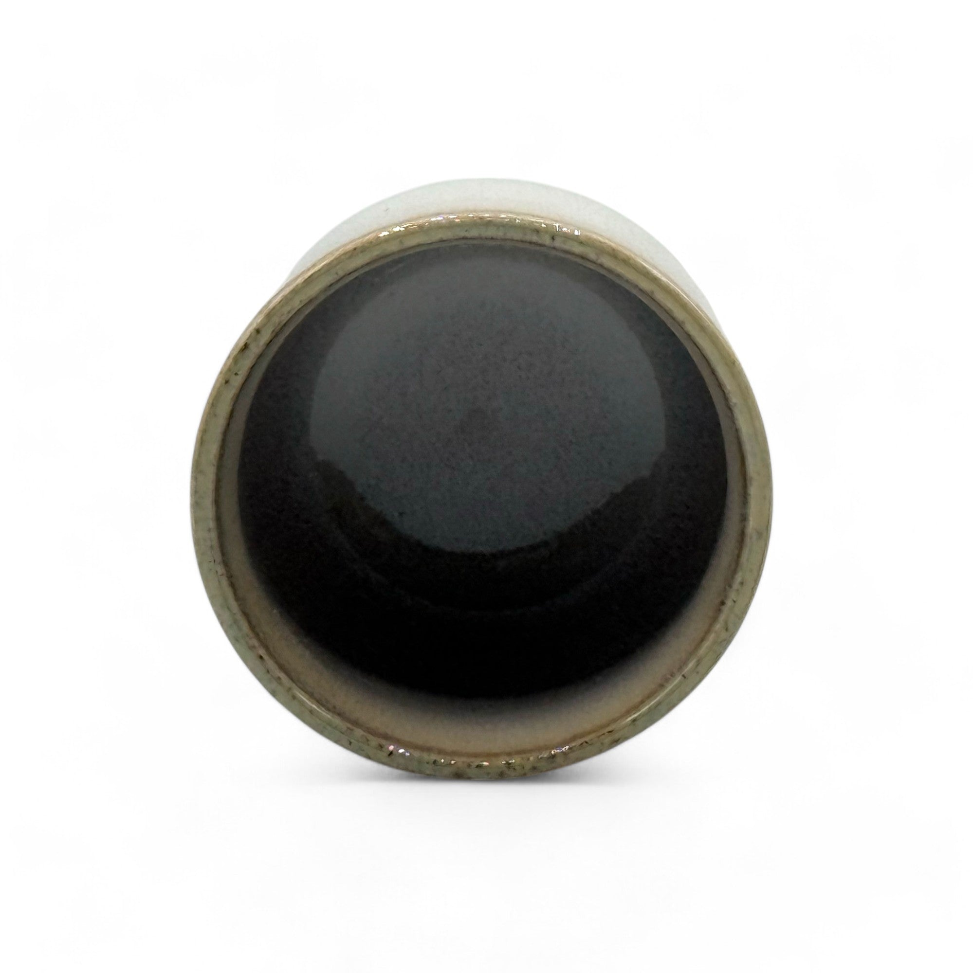 Handcrafted Mino-yaki Yunomi Japanese teacup with traditional glaze, perfect for daily tea rituals.