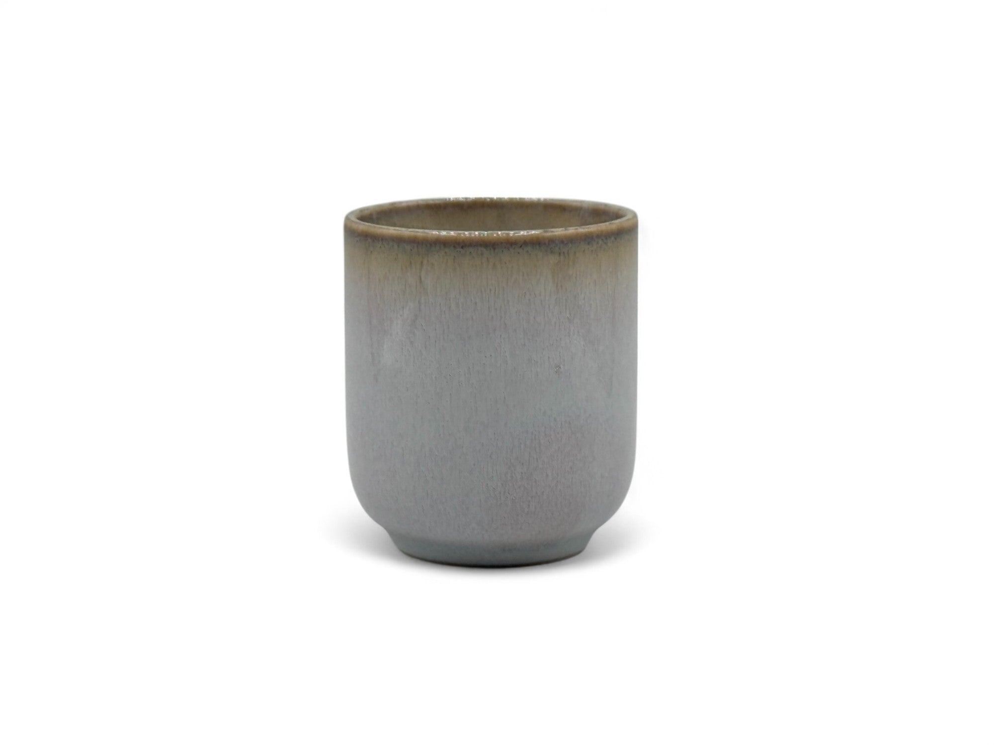 Handcrafted Mino-yaki Yunomi Japanese teacup with traditional glaze, perfect for daily tea rituals.