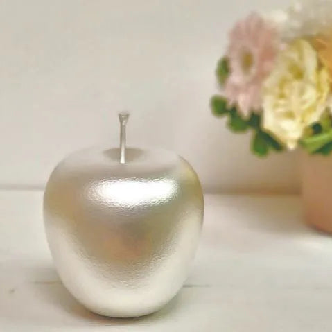 Pure silver Japanese apple bobblehead figurine – handcrafted artisan gift, collectible decor with elegant metallic shine.