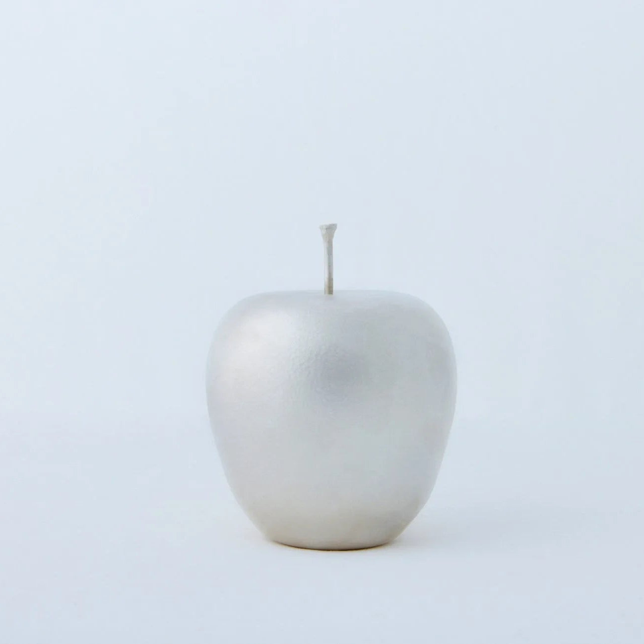 Pure silver Japanese apple bobblehead figurine – handcrafted artisan gift, collectible decor with elegant metallic shine.