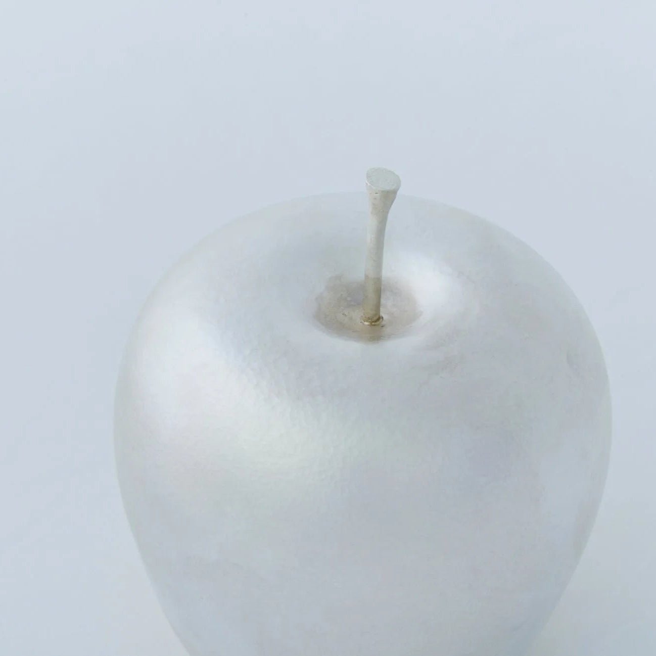 Pure silver Japanese apple bobblehead figurine – handcrafted artisan gift, collectible decor with elegant metallic shine.