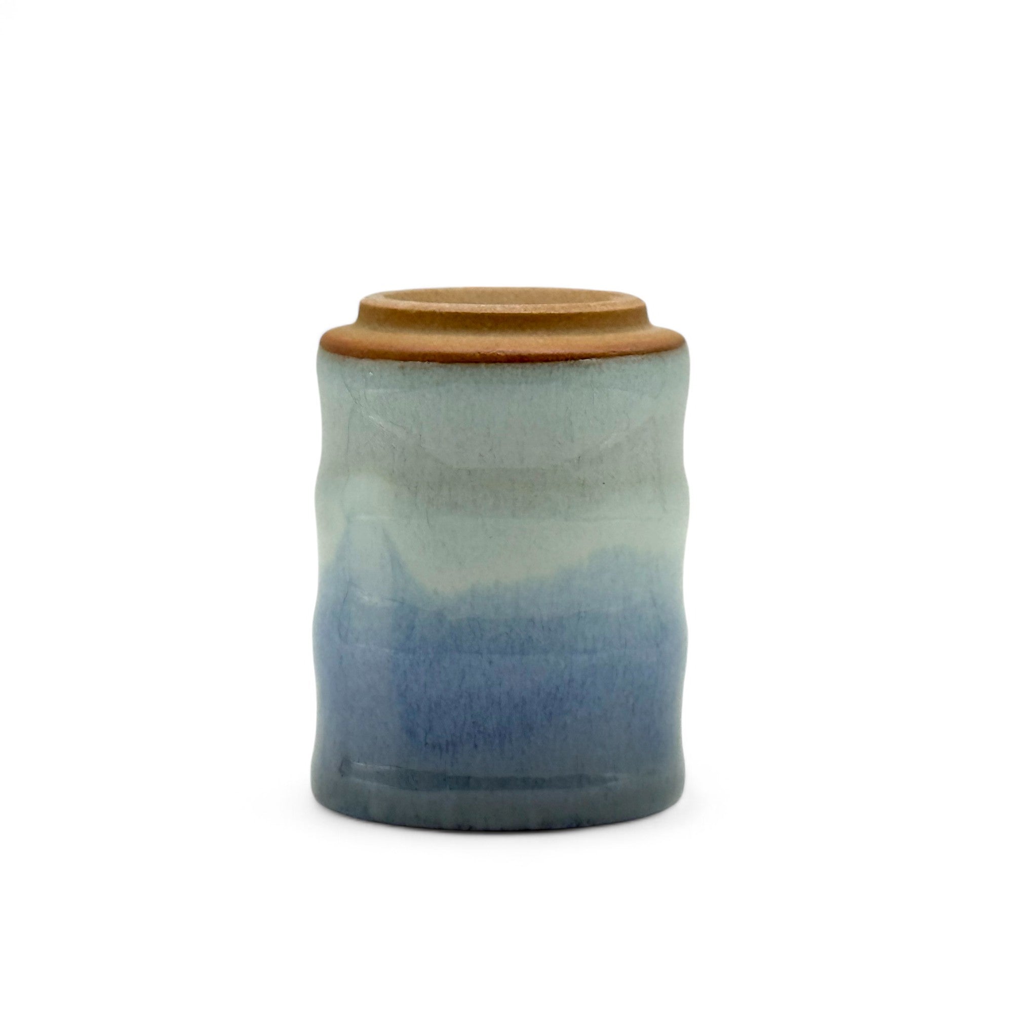 Handcrafted Mino-yaki Yunomi Japanese teacup with traditional glaze, perfect for daily tea rituals.