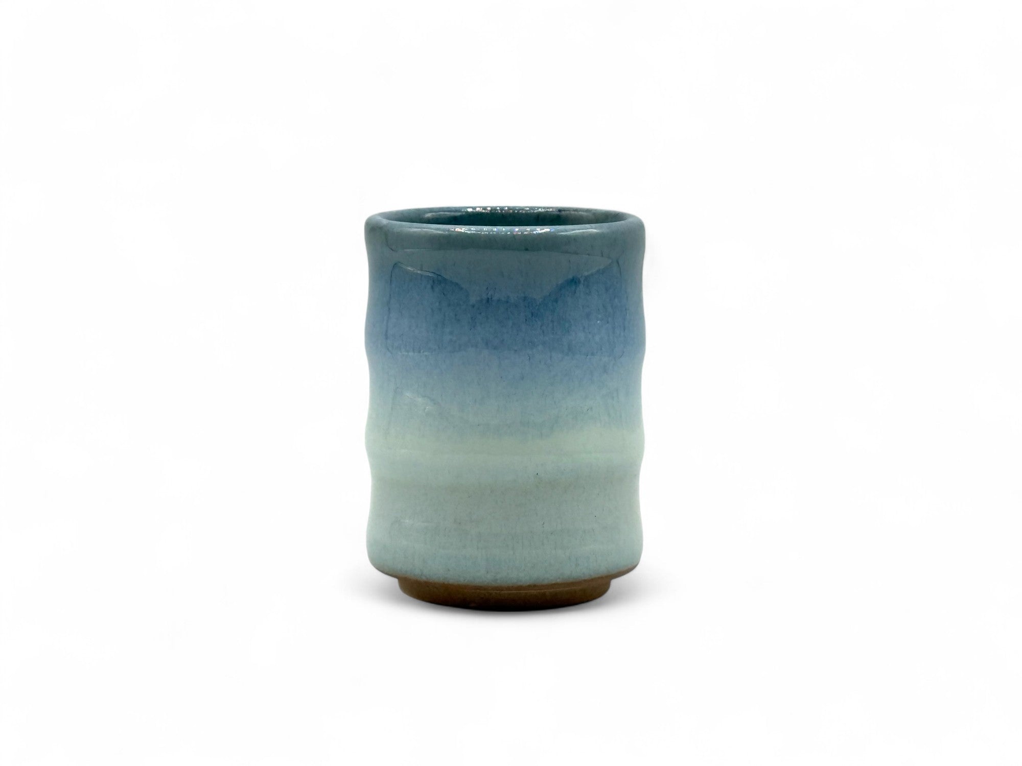 Handcrafted Mino-yaki Yunomi Japanese teacup with traditional glaze, perfect for daily tea rituals.