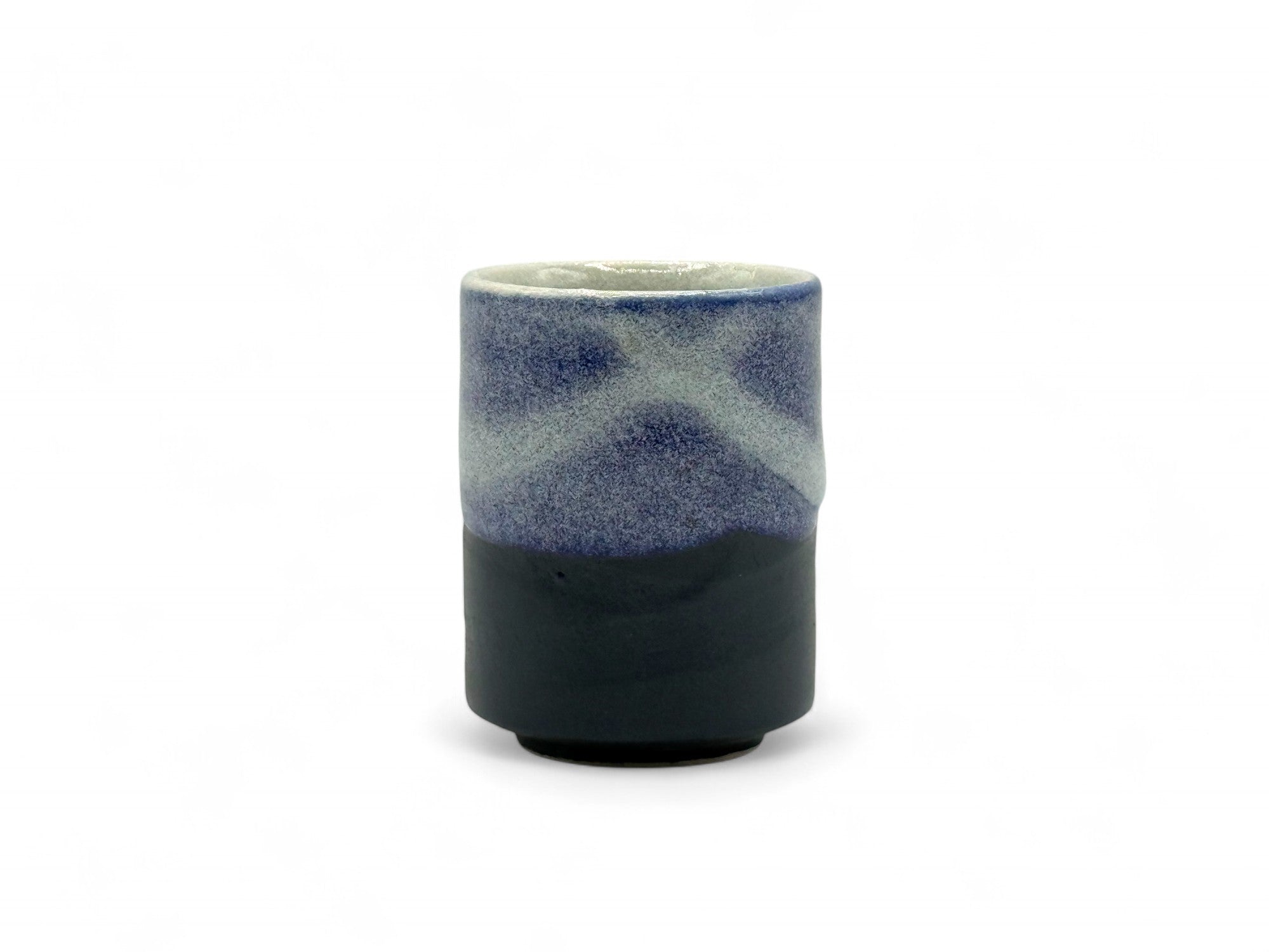 Handcrafted Mino-yaki Yunomi Japanese teacup with traditional glaze, perfect for daily tea rituals.