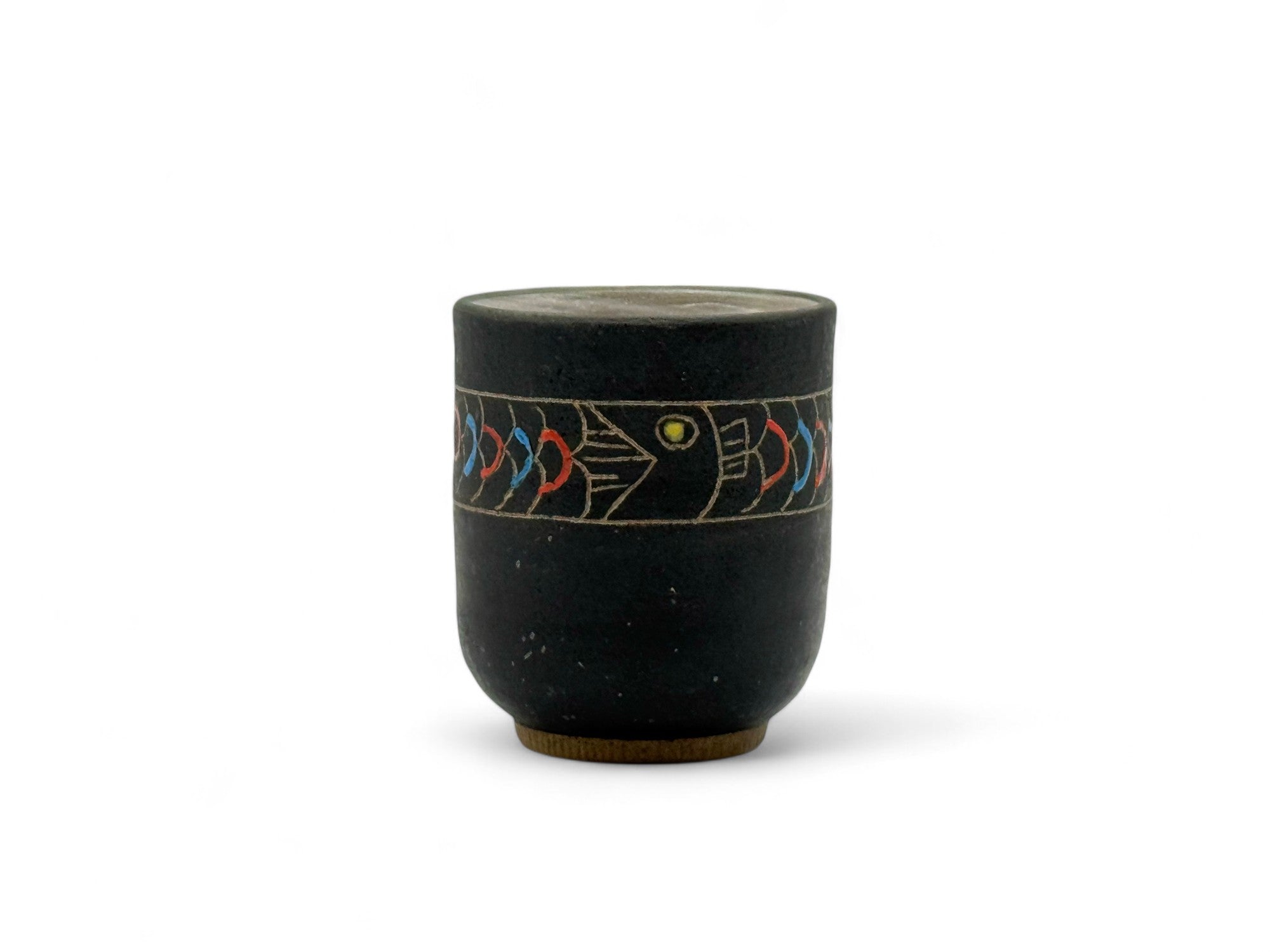 Handcrafted Mino-yaki Yunomi Japanese teacup with traditional glaze, perfect for daily tea rituals.