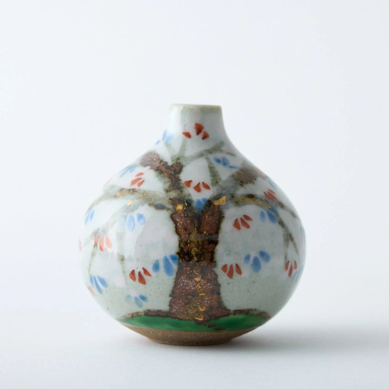 Sakura Tesai Kabin Japanese flower vase, handcrafted ceramic with cherry blossom design.