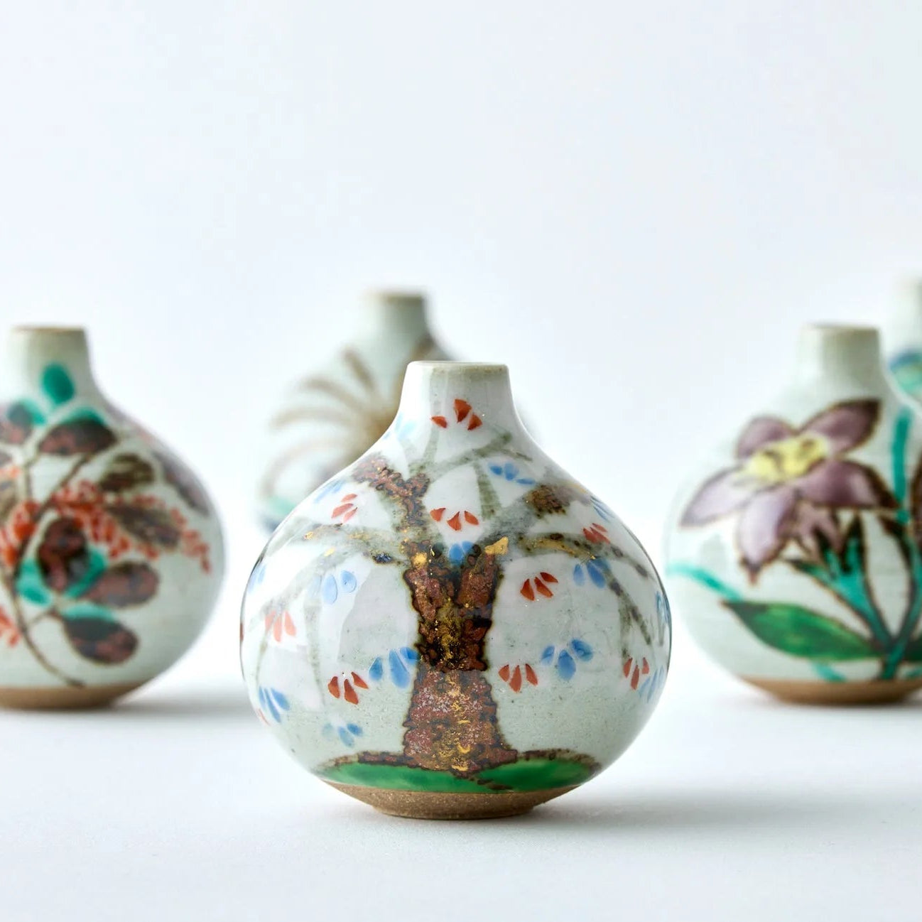 Sakura Tesai Kabin Japanese flower vase, handcrafted ceramic with cherry blossom design.