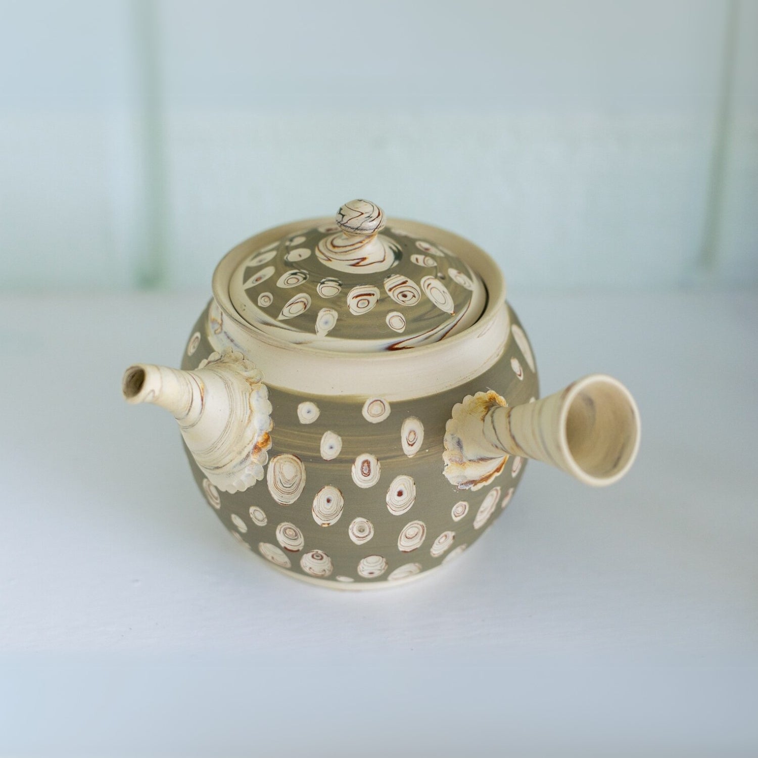 Seijaku Japanese Kyusu tea set with traditional ceramic teapot and cups for authentic green tea brewing.