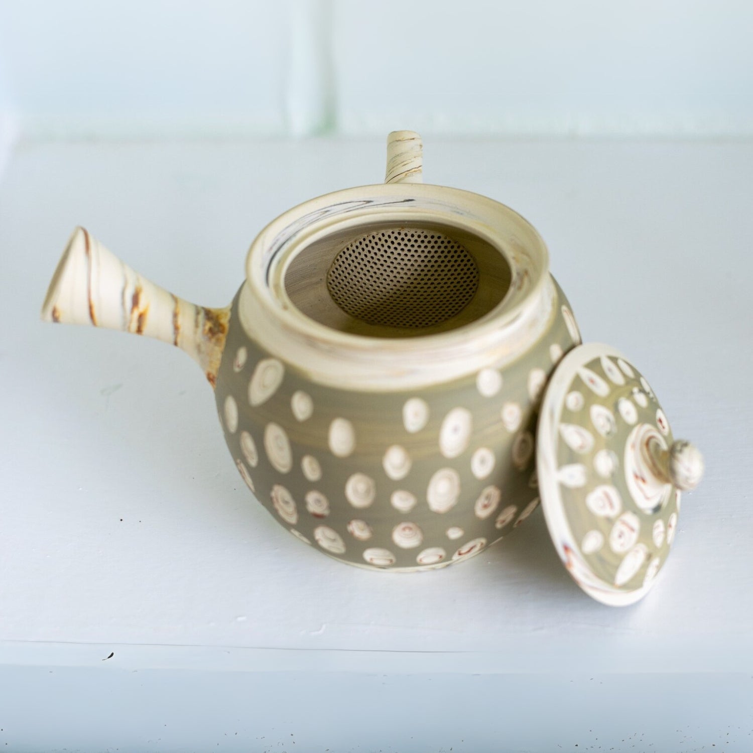 Seijaku Japanese Kyusu tea set with traditional ceramic teapot and cups for authentic green tea brewing.