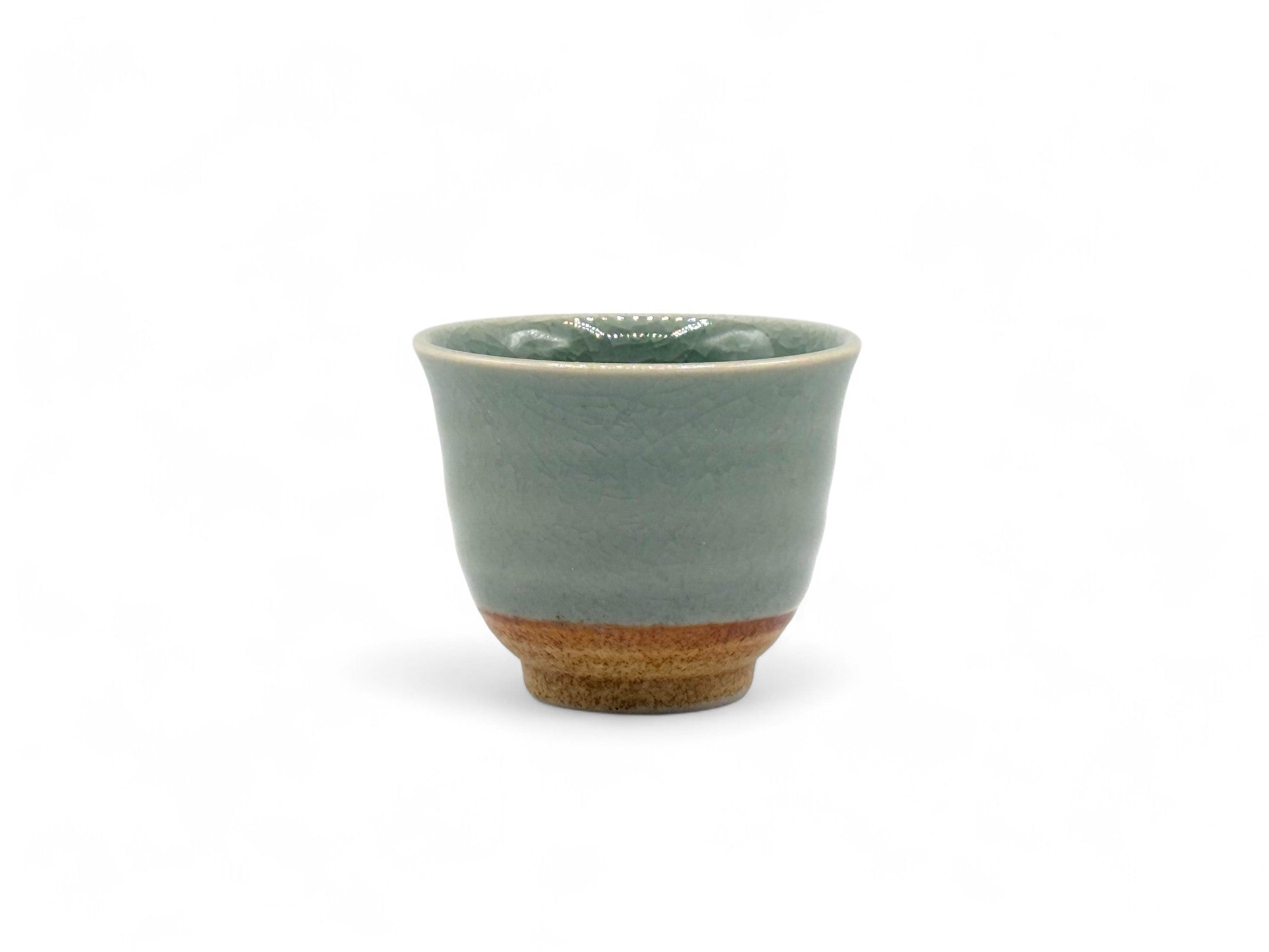 Handcrafted Mino-yaki Yunomi Japanese Sencha teacup with traditional glaze, perfect for daily tea rituals.