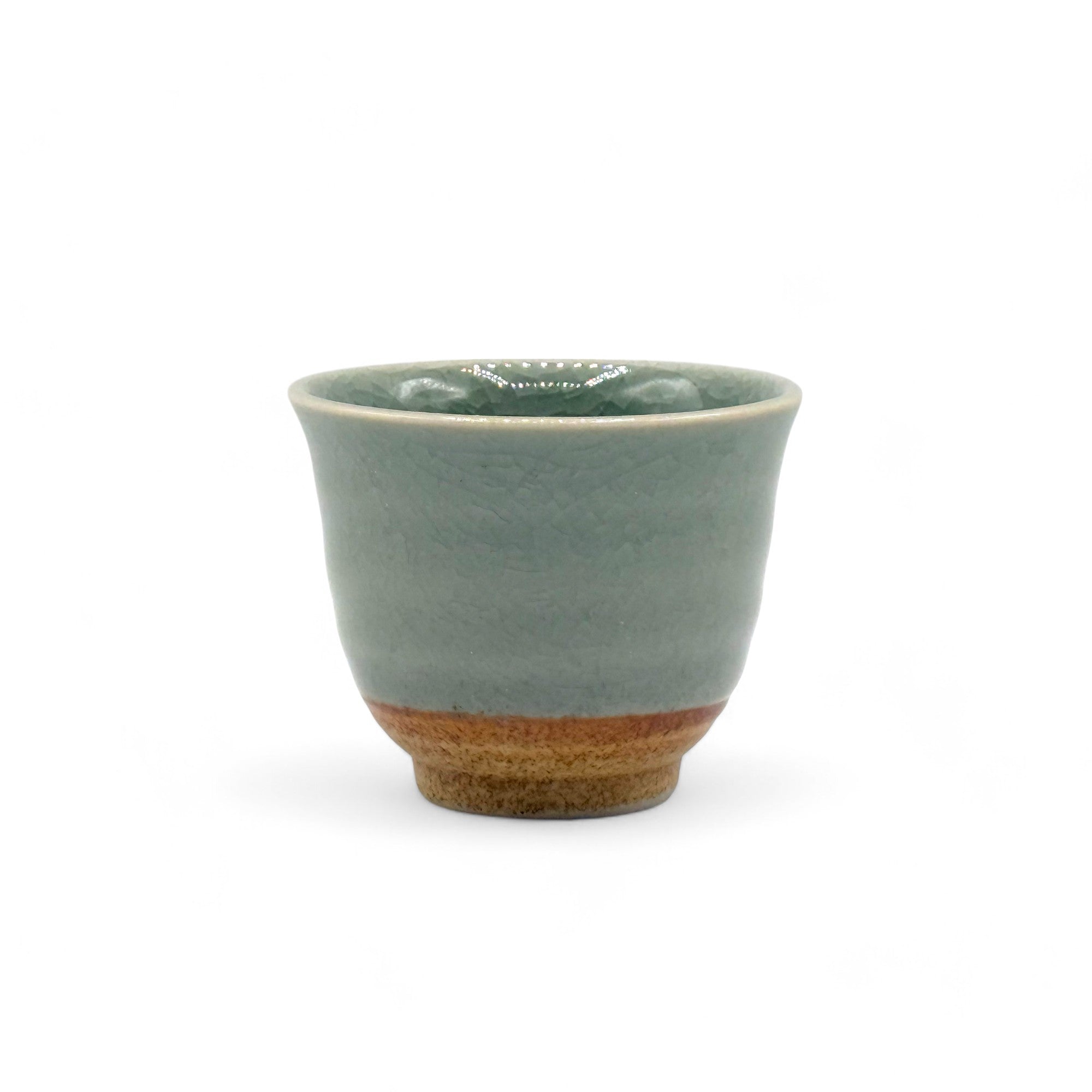 Handcrafted Mino-yaki Yunomi Japanese Sencha teacup with traditional glaze, perfect for daily tea rituals.