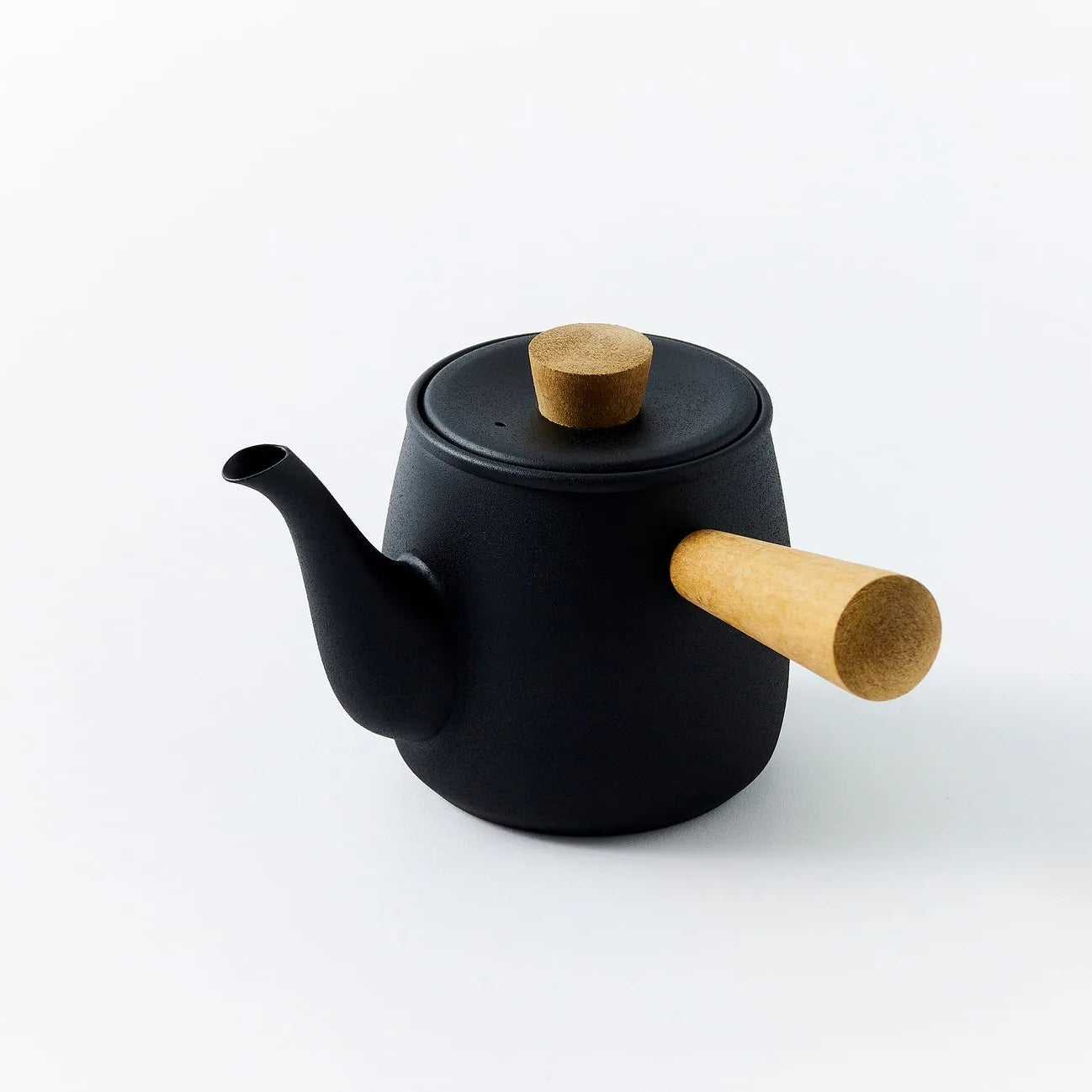Seikoku black stainless steel teapot with modern Japanese design for elegant tea brewing.
