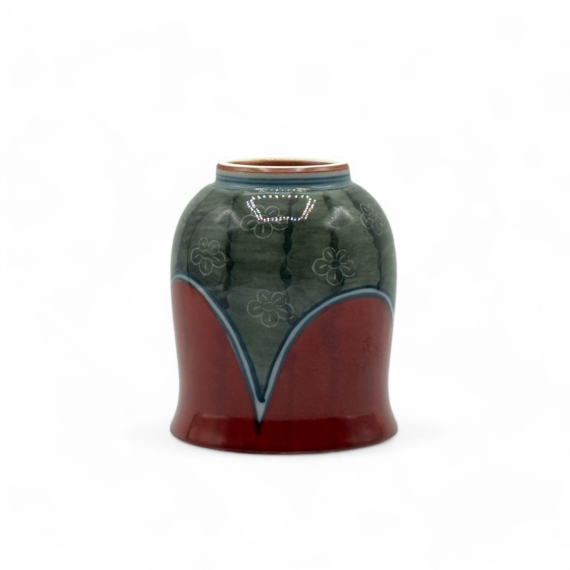 Handcrafted Hasami-yaki Yunomi Japanese teacup with traditional glaze, perfect for daily tea rituals.