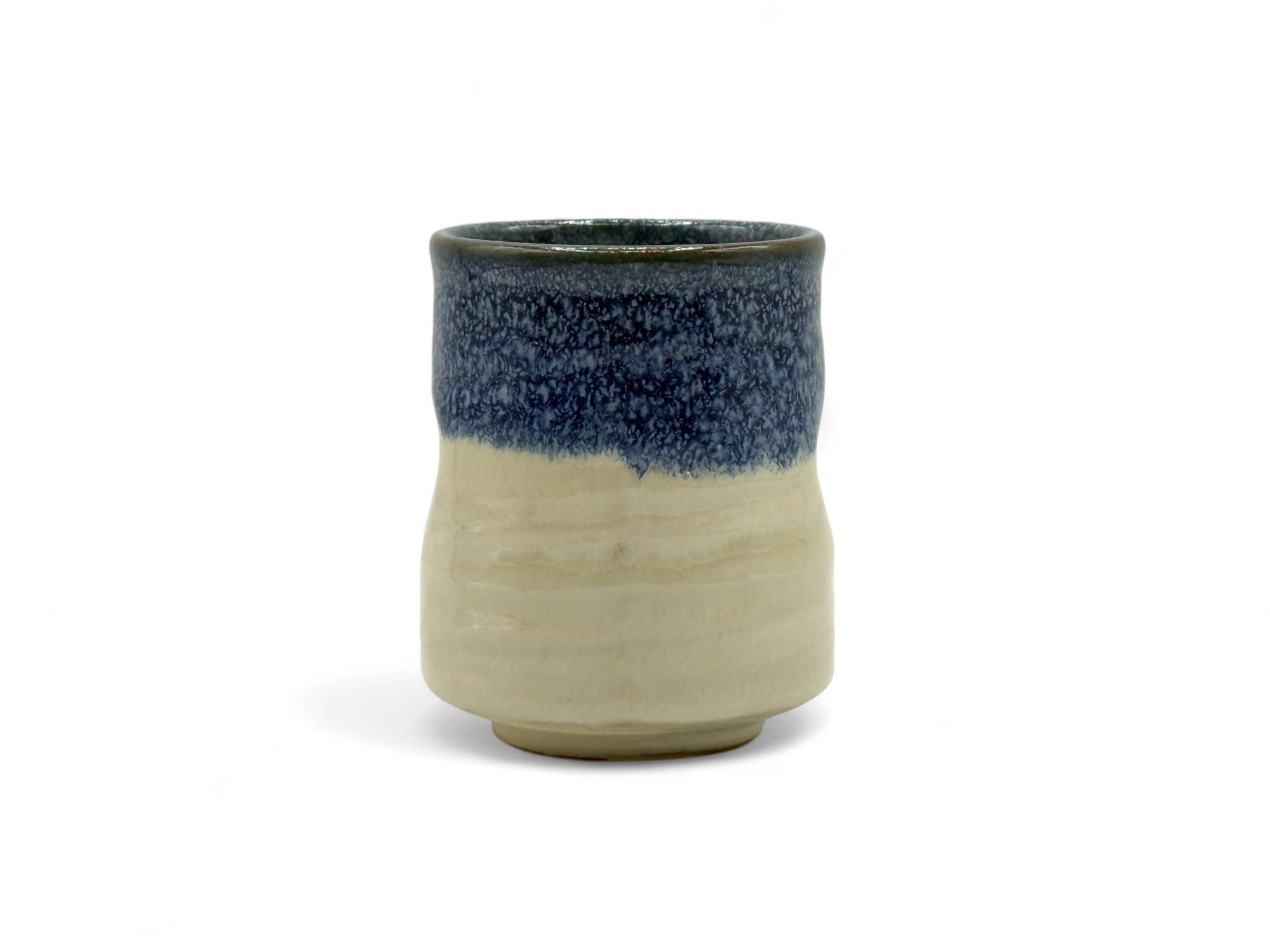 Handcrafted Mino-yaki Yunomi Japanese teacup with traditional glaze, perfect for daily tea rituals.