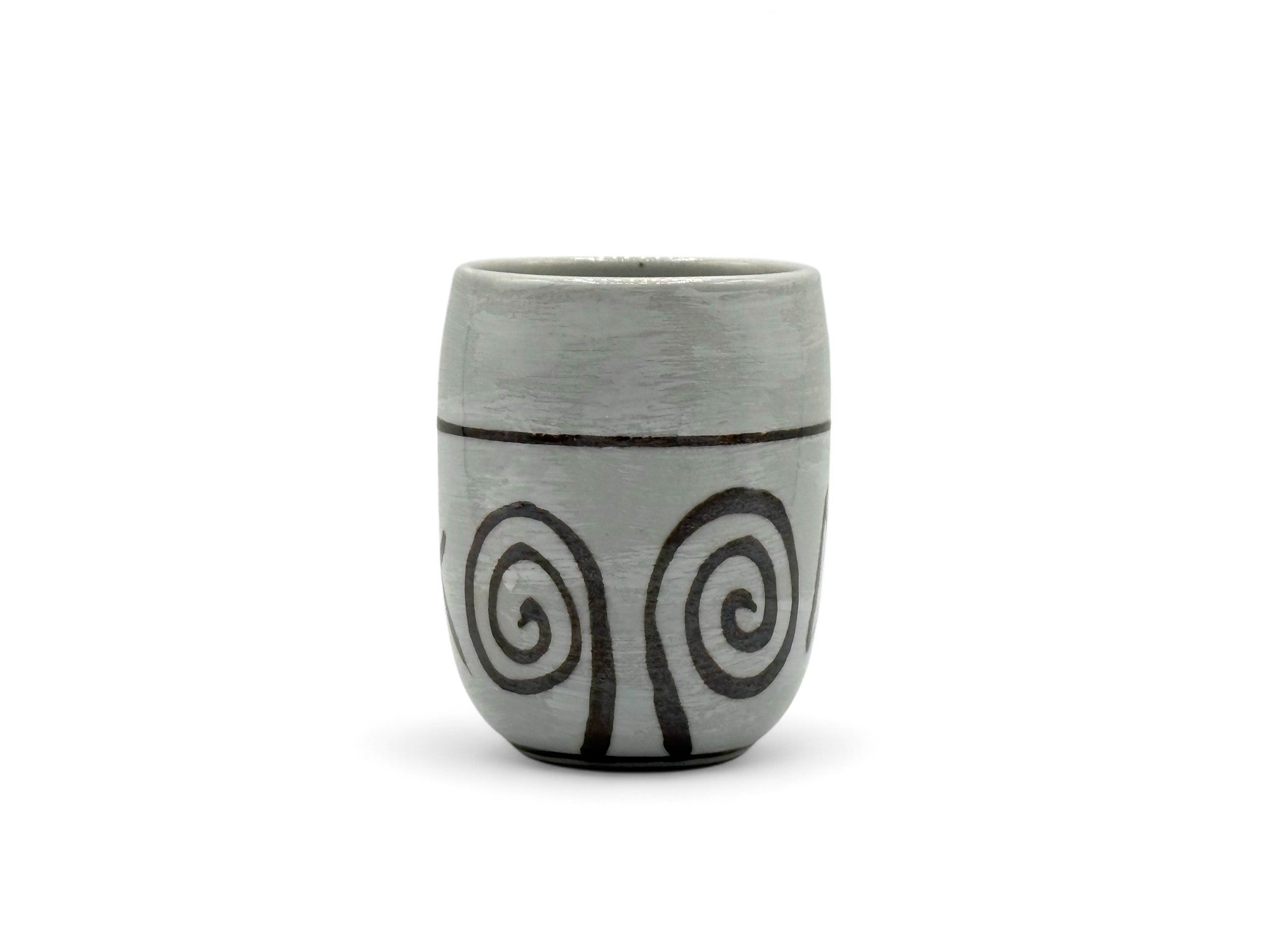 Handcrafted Mino-yaki Yunomi Japanese teacup with traditional glaze, perfect for daily tea rituals.