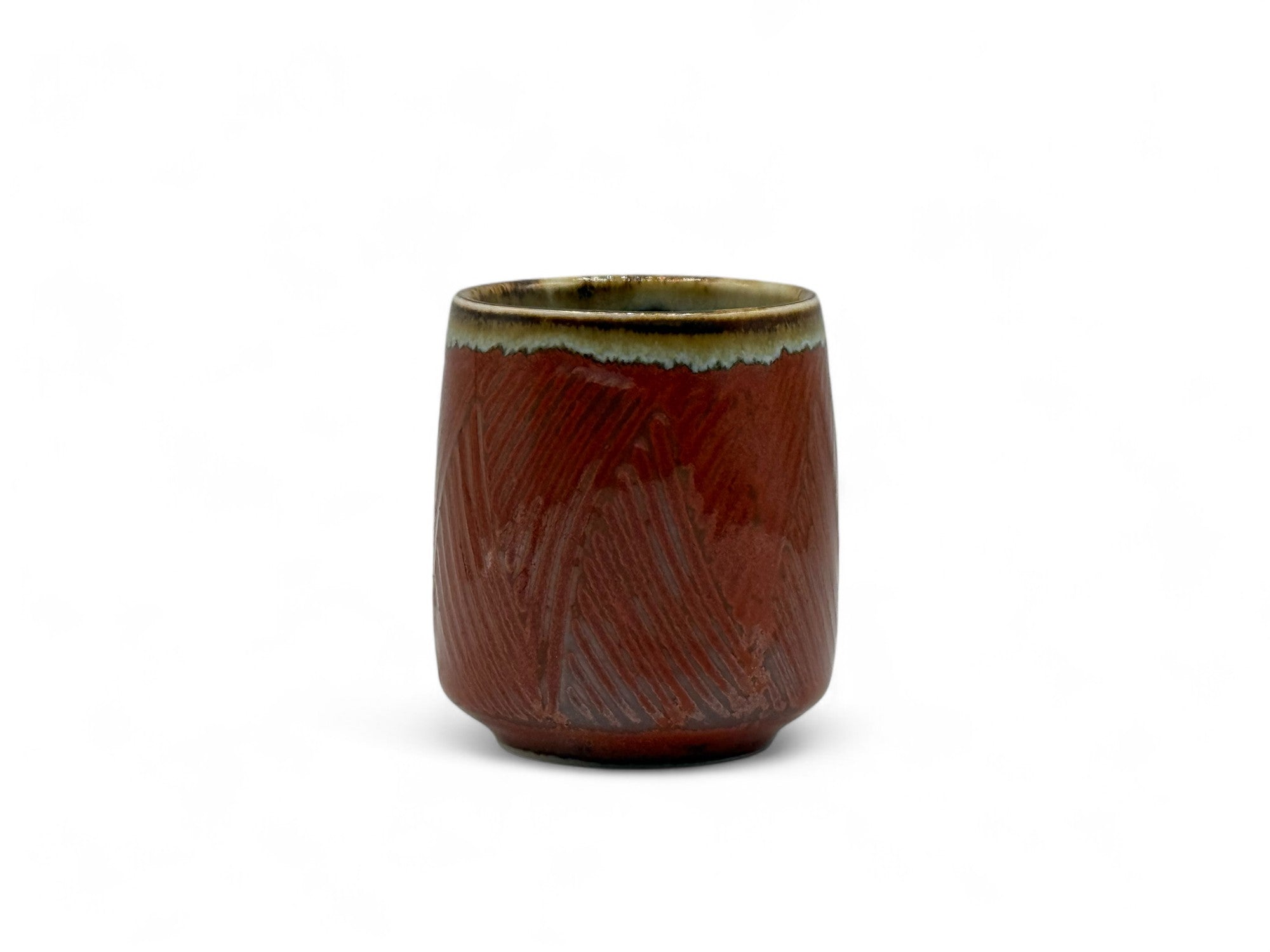 Handcrafted Mino-yaki Yunomi Japanese teacup with traditional glaze, perfect for daily tea rituals.