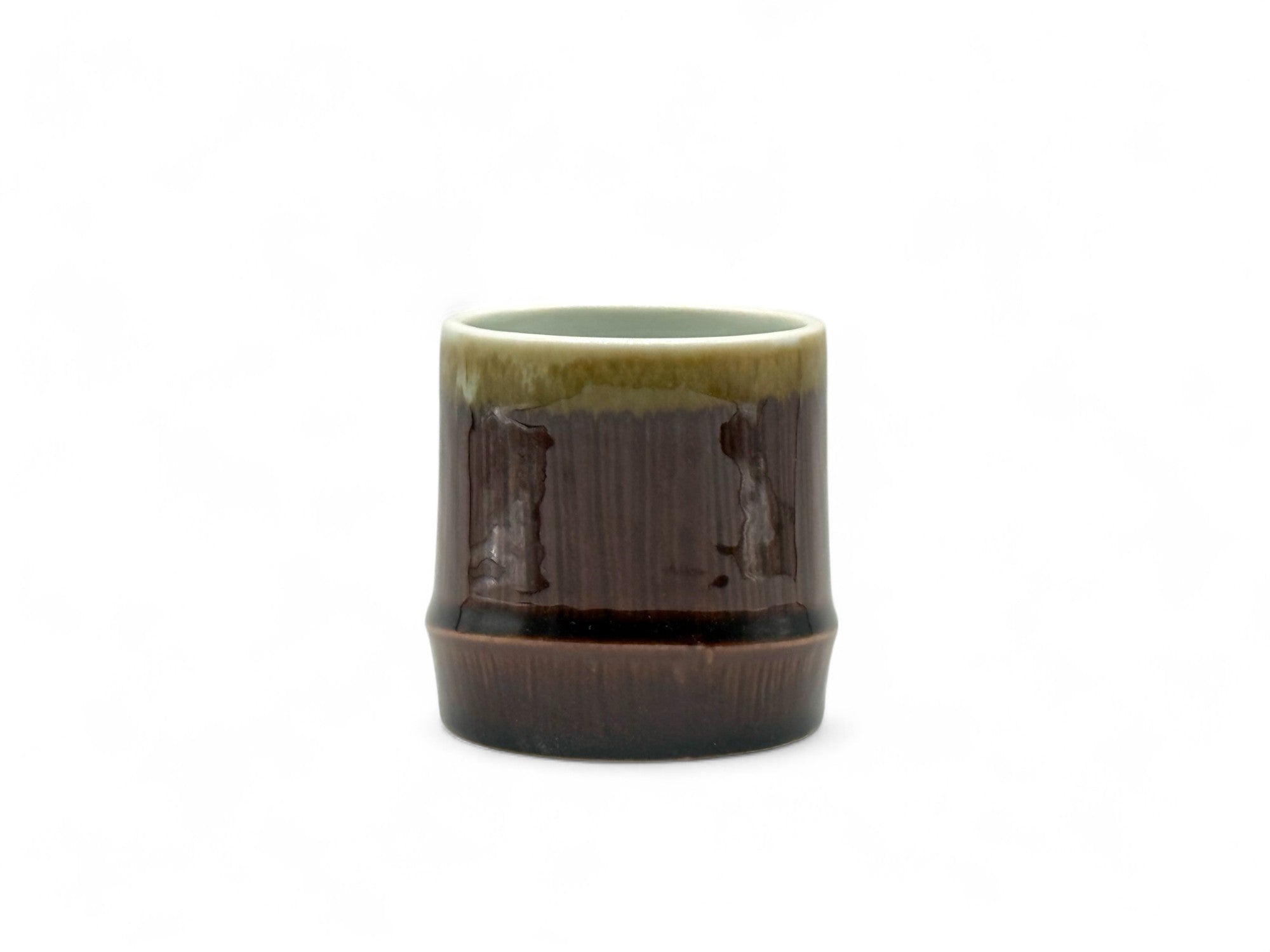 Handcrafted Mino-yaki Yunomi Japanese teacup with traditional glaze, perfect for daily tea rituals.