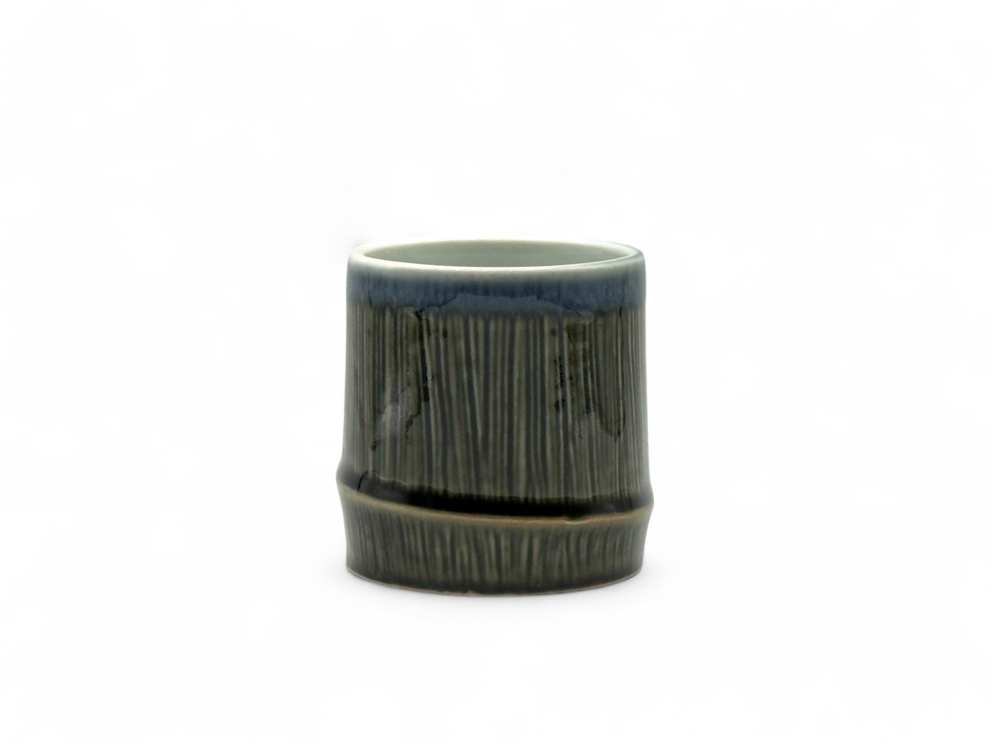 Handcrafted Mino-yaki Yunomi Japanese teacup with traditional glaze, perfect for daily tea rituals.
