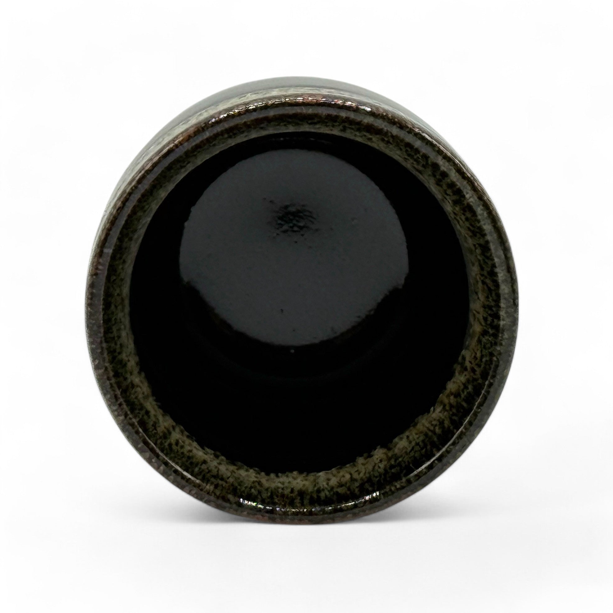 Handcrafted Mino-yaki Yunomi Japanese teacup with traditional glaze, perfect for daily tea rituals.