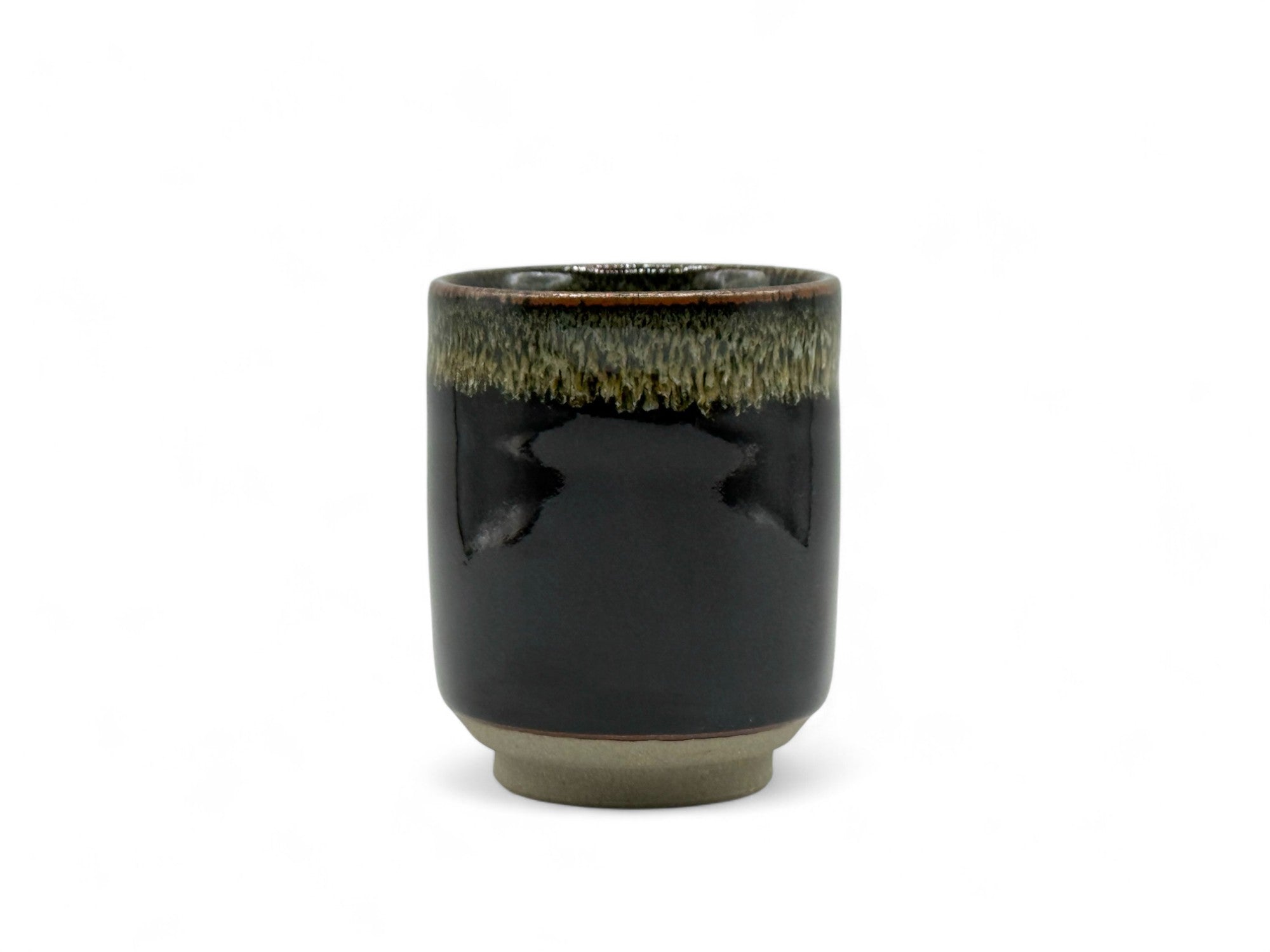 Handcrafted Mino-yaki Yunomi Japanese teacup with traditional glaze, perfect for daily tea rituals.