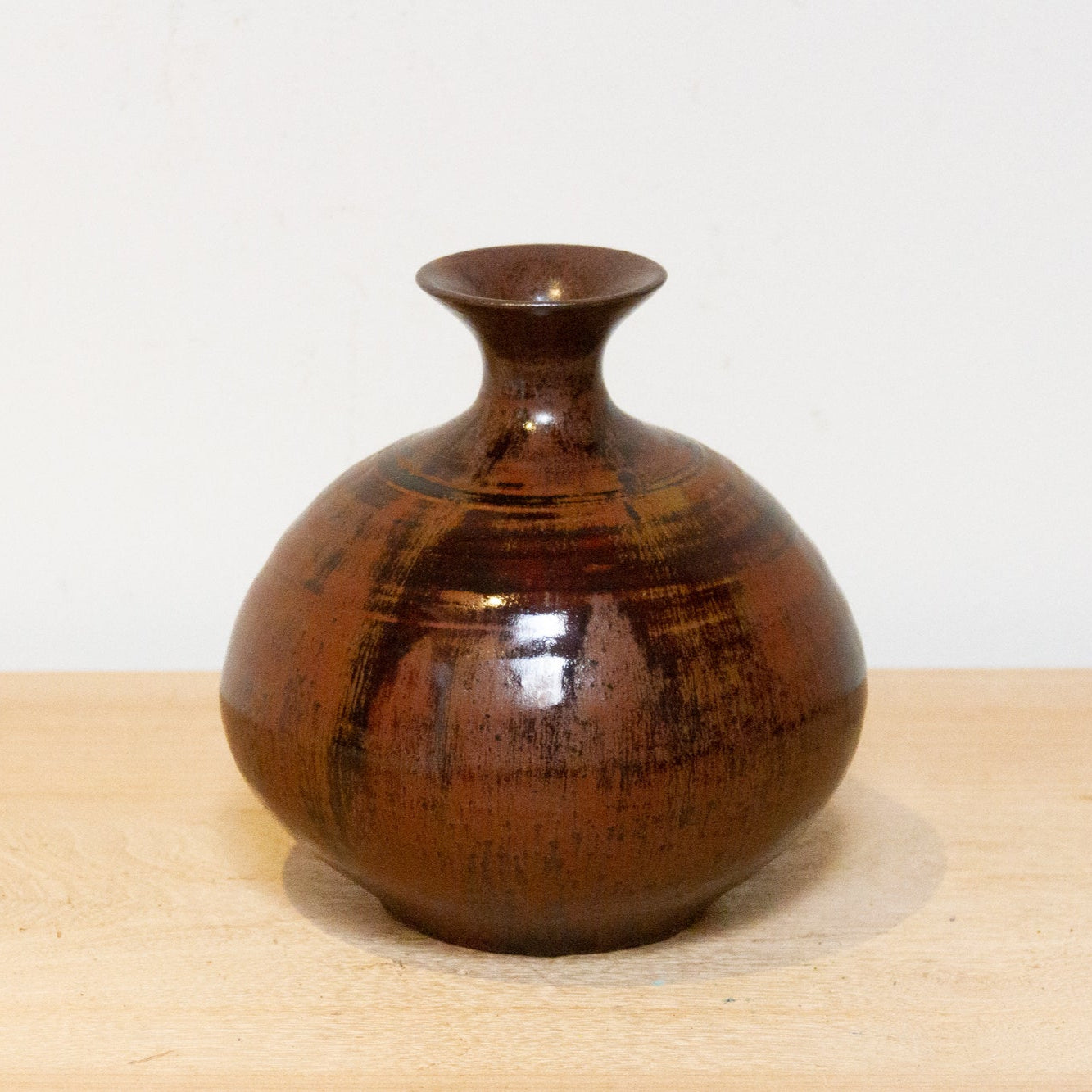 Vintage Japanese stoneware vase “Tsuchi,” handmade ceramic with wabi-sabi design and earthy tones for home decor.