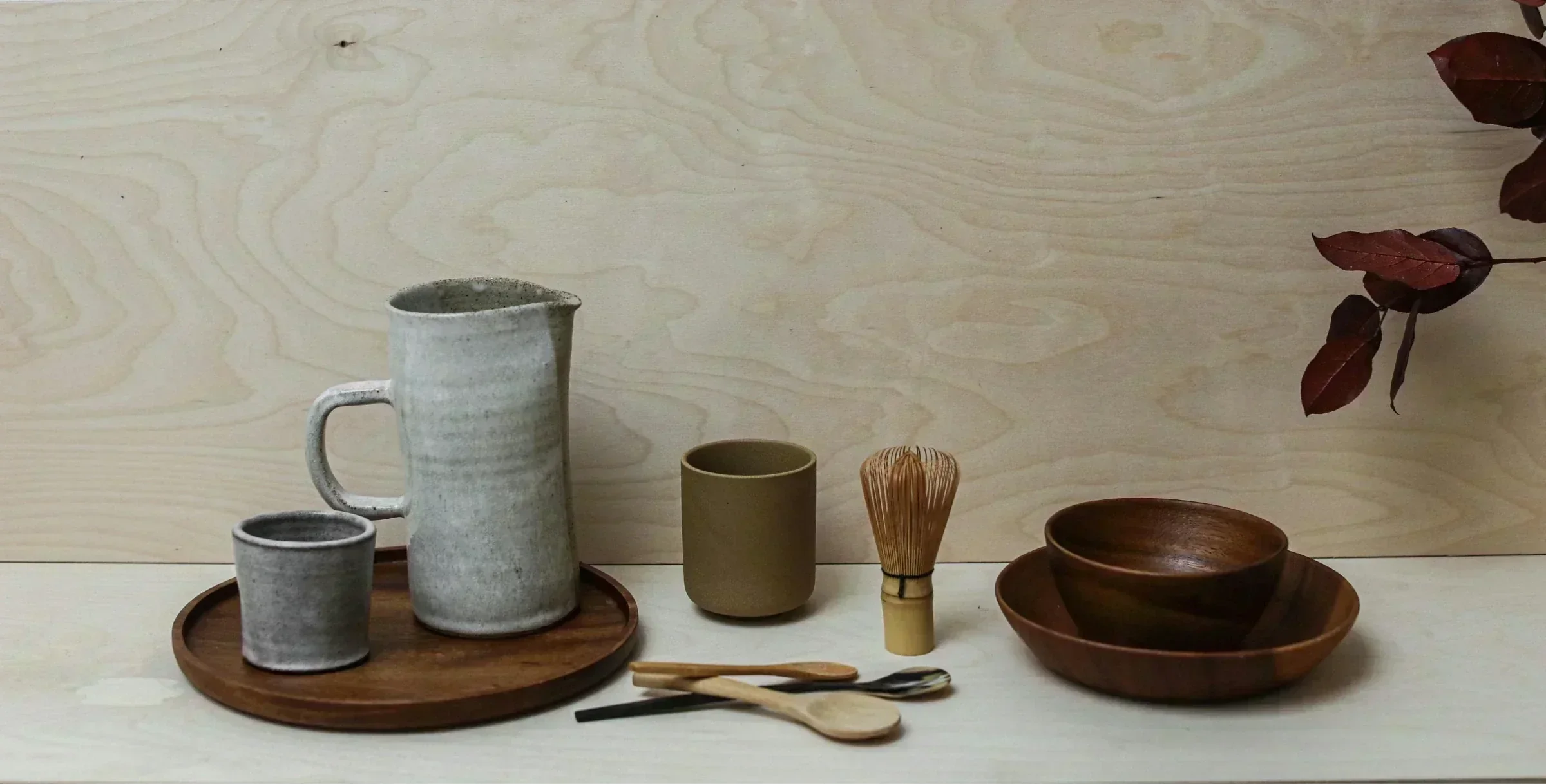 Japanese rustic bathroom decoration with wooden accents, natural stone elements, and minimalist wabi-sabi-inspired design.