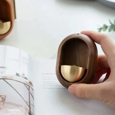 Japanese wooden doorbell with traditional design, handcrafted for a stylish and functional addition to home entrance decor.